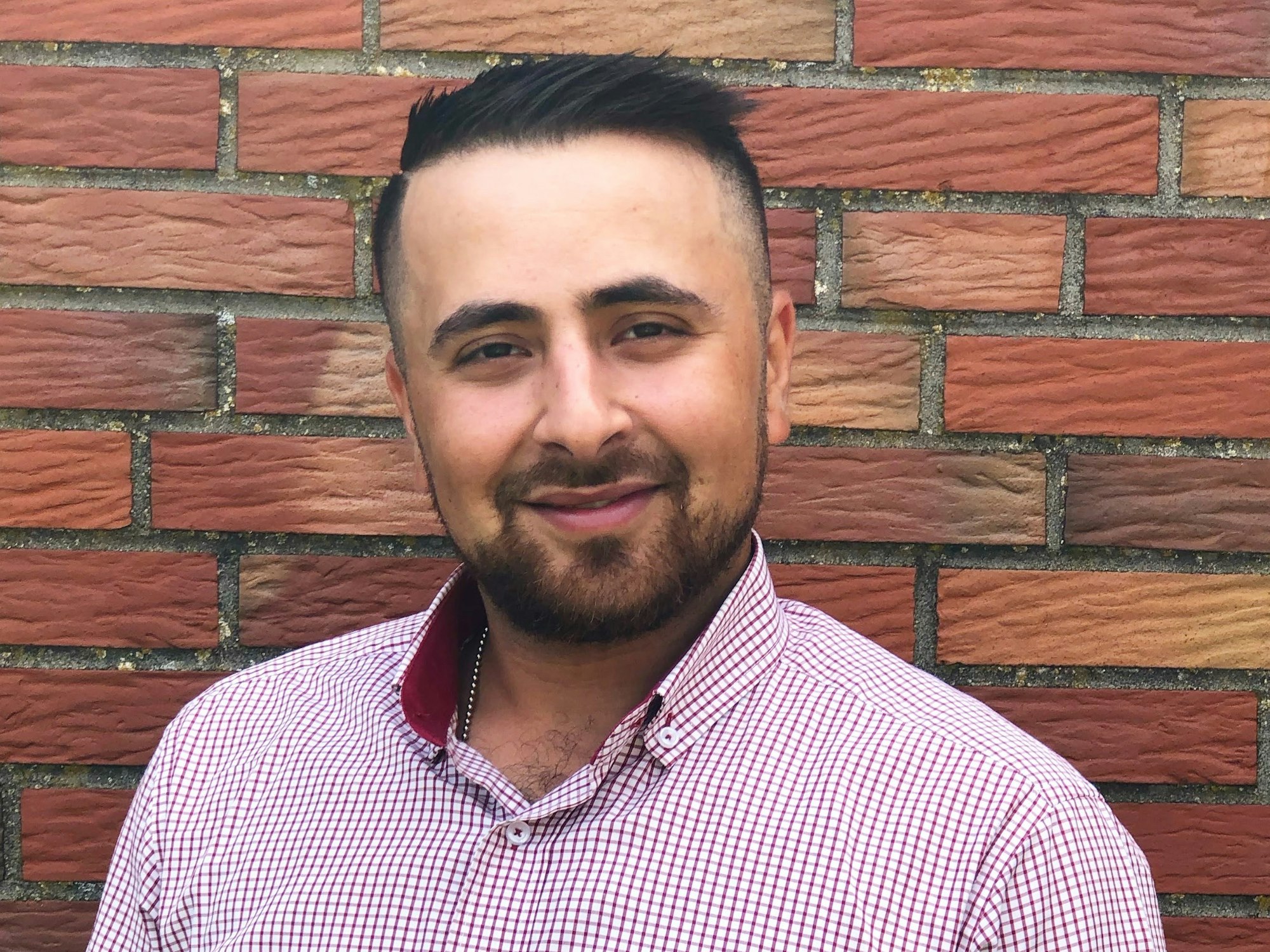 Der Kölner Autohändler Mohamad Obeid im Porträt.