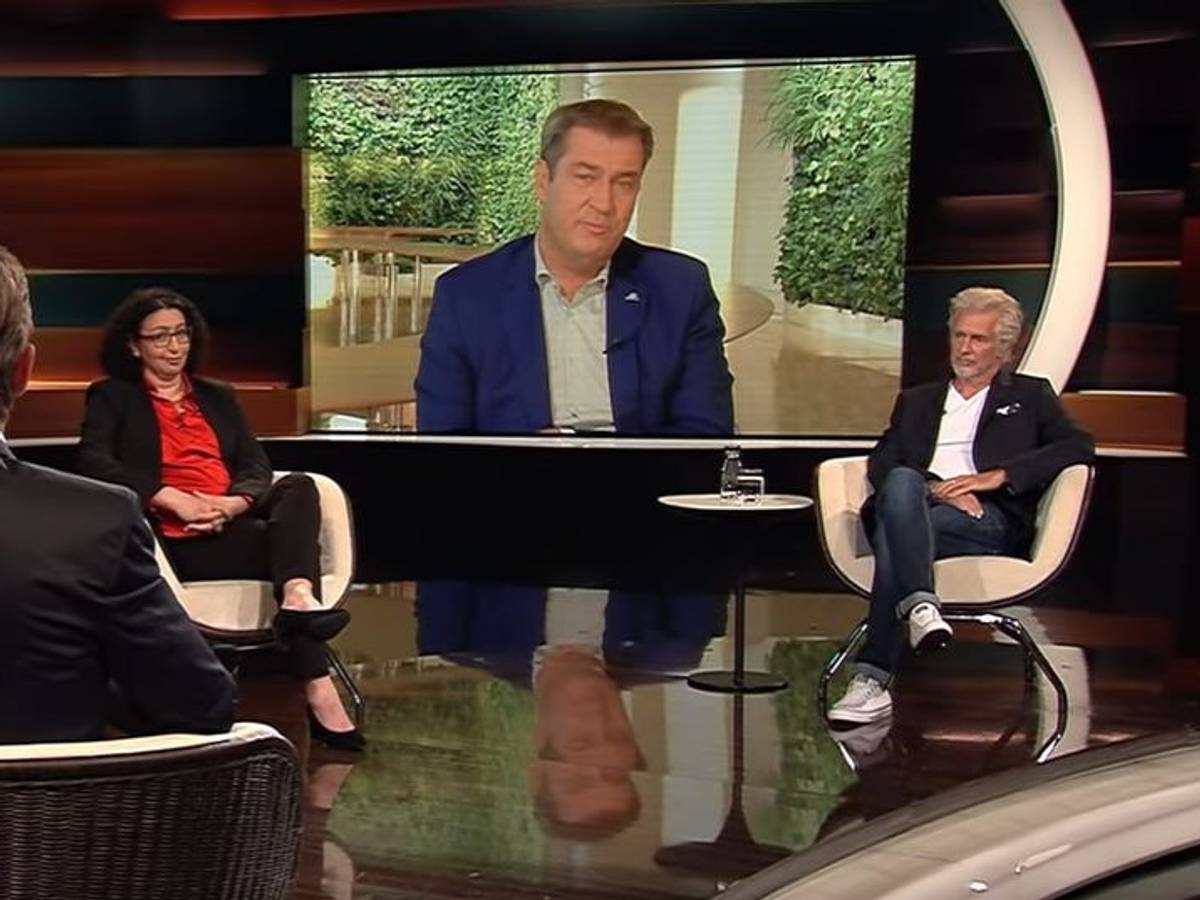 Im Studio von Markus Lanz sitzen Manager Herbert Diess, Bauingenieurin Lamia Messari-Becker und Autor Frank Schätzing (v.l.). Markus Söder ist zugeschaltet.