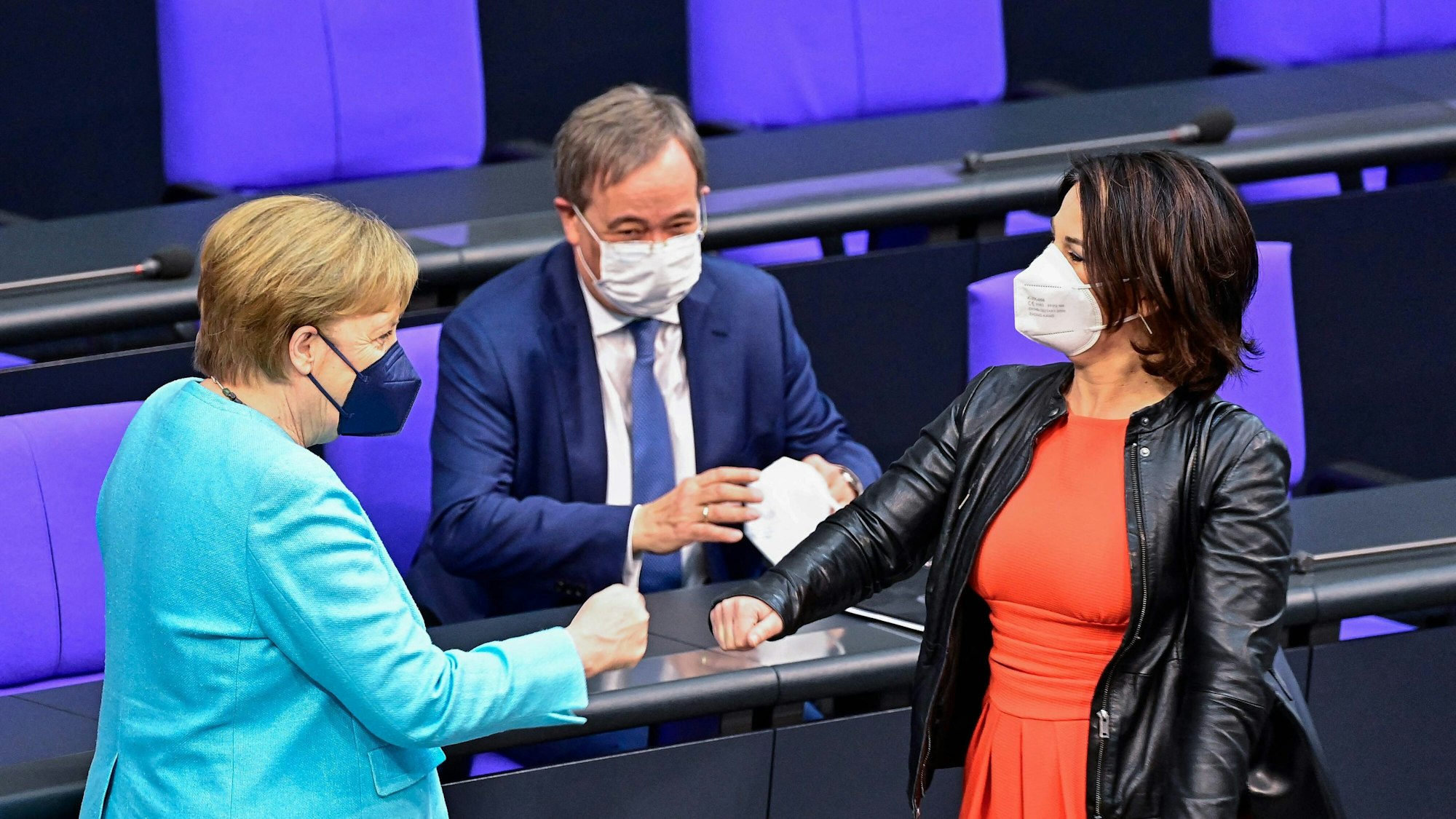 Angela Merkel, Armin Laschet und Annalena Baerbock im Juni 2021 im Bundestag.