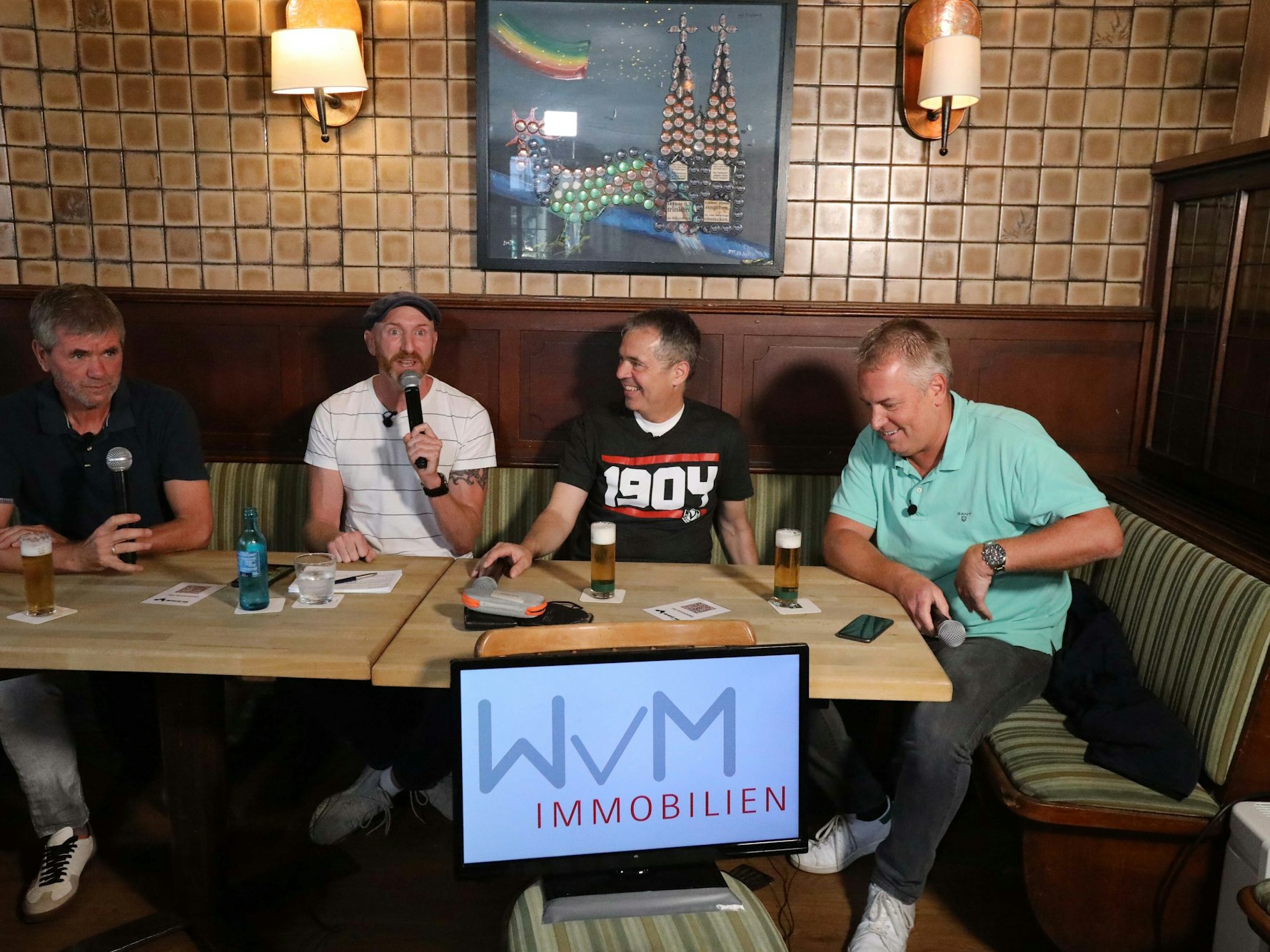 Friedhelm Funkel mit Martin Schopps, Andreas Rettig und Marcel Schwamborn.