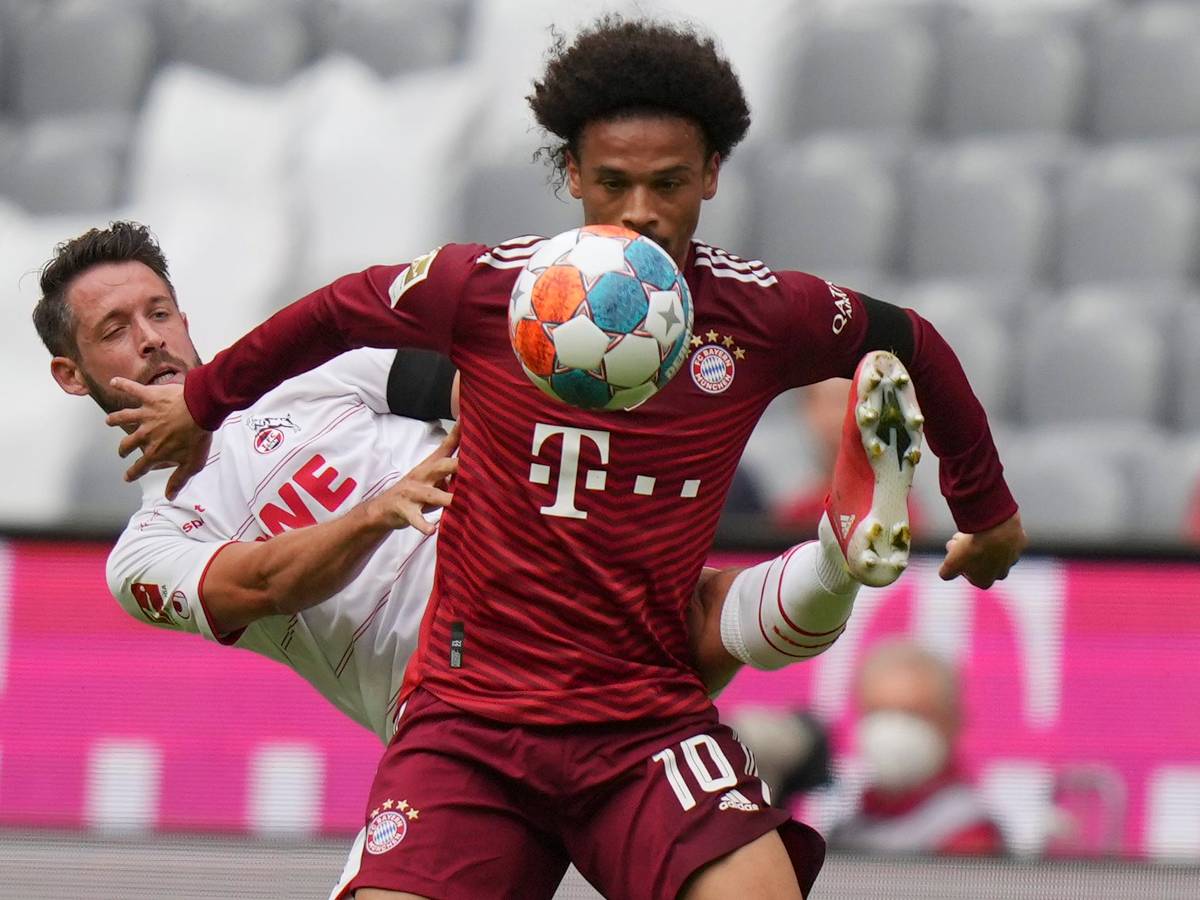 Leroy Sané im Duell mit Kölns Mark Uth.