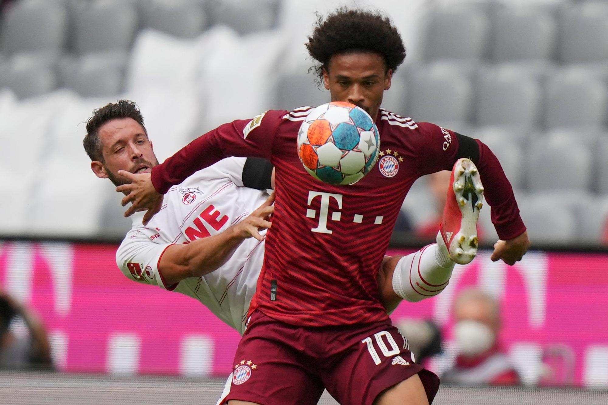 Leroy Sané im Duell mit Kölns Mark Uth.
