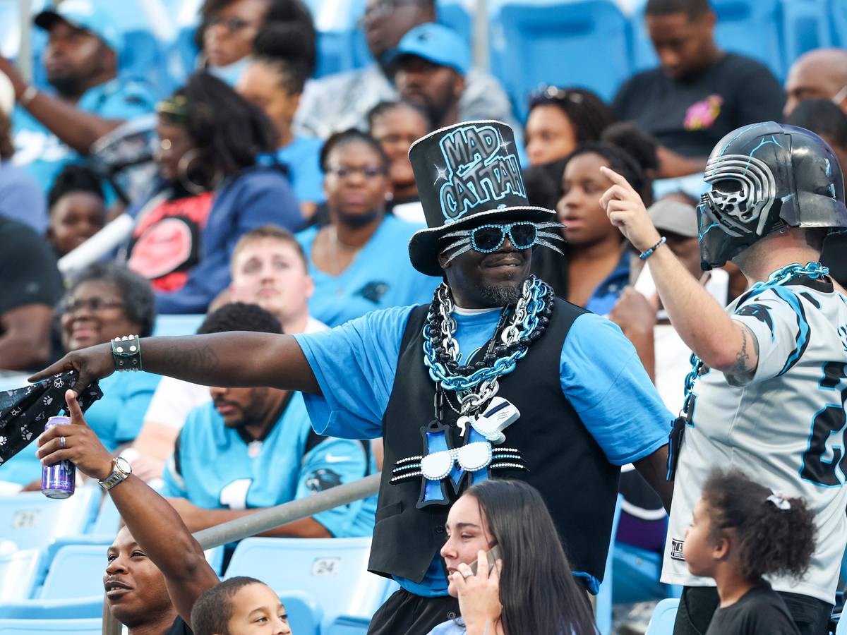 Carolina Panthers fans enjoy Fan Fest at the NFL football team's training camp in Charlotte, N.C., Friday, Aug. 6, 2021. (AP Photo/Nell Redmond)