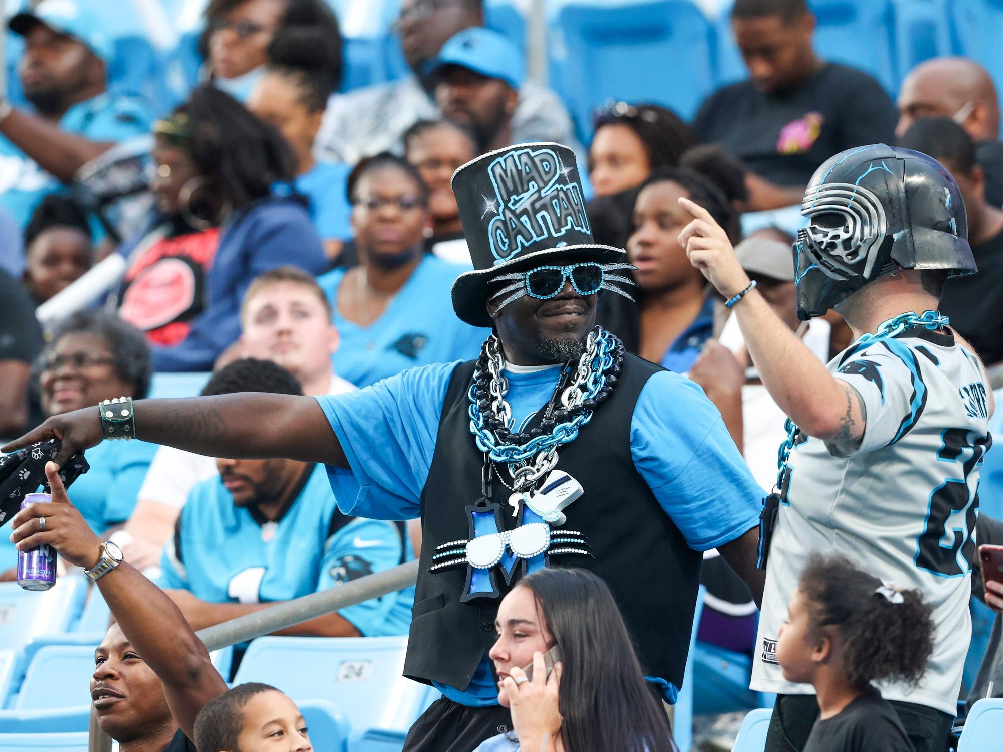 Carolina Panthers fans enjoy Fan Fest at the NFL football team's training camp in Charlotte, N.C., Friday, Aug. 6, 2021. (AP Photo/Nell Redmond)