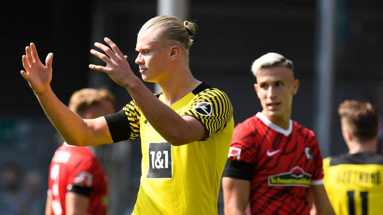 Dortmund's Norwegian forward Erling Braut Haaland reacts during the German first division Bundesliga football match SC Freiburg v Borussia Dortmund in Freiburg, southwestern Germany on August 21, 2021. (Photo by Thomas KIENZLE / AFP) / DFL REGULATIONS PROHIBIT ANY USE OF PHOTOGRAPHS AS IMAGE SEQUENCES AND/OR QUASI-VIDEO