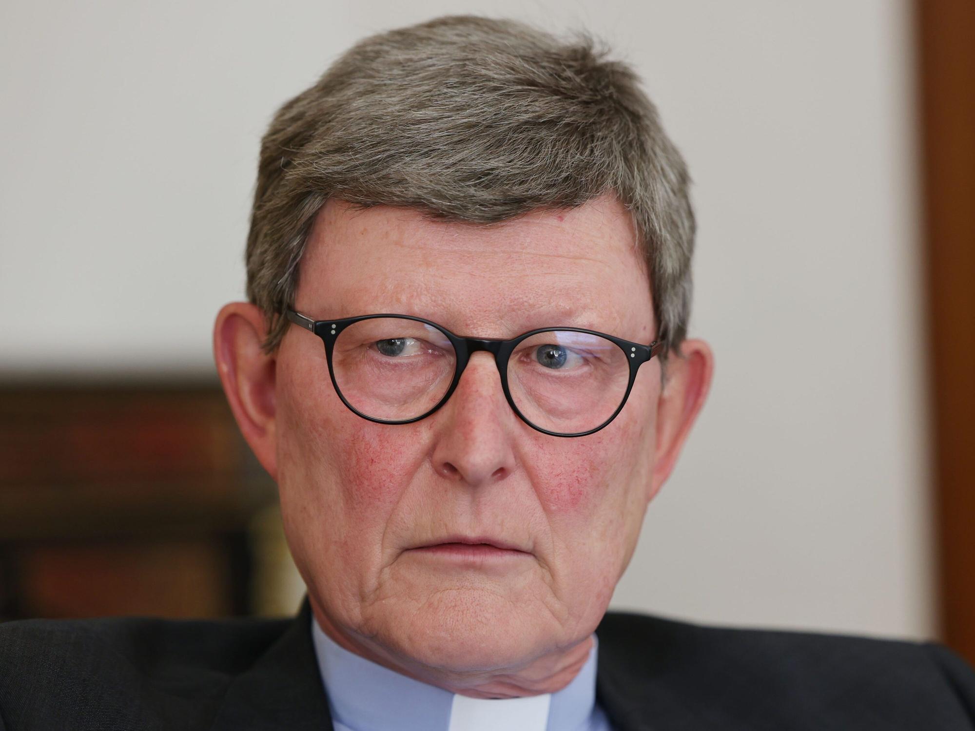 Kardinal Rainer Maria Woelki mit ernster Miene.