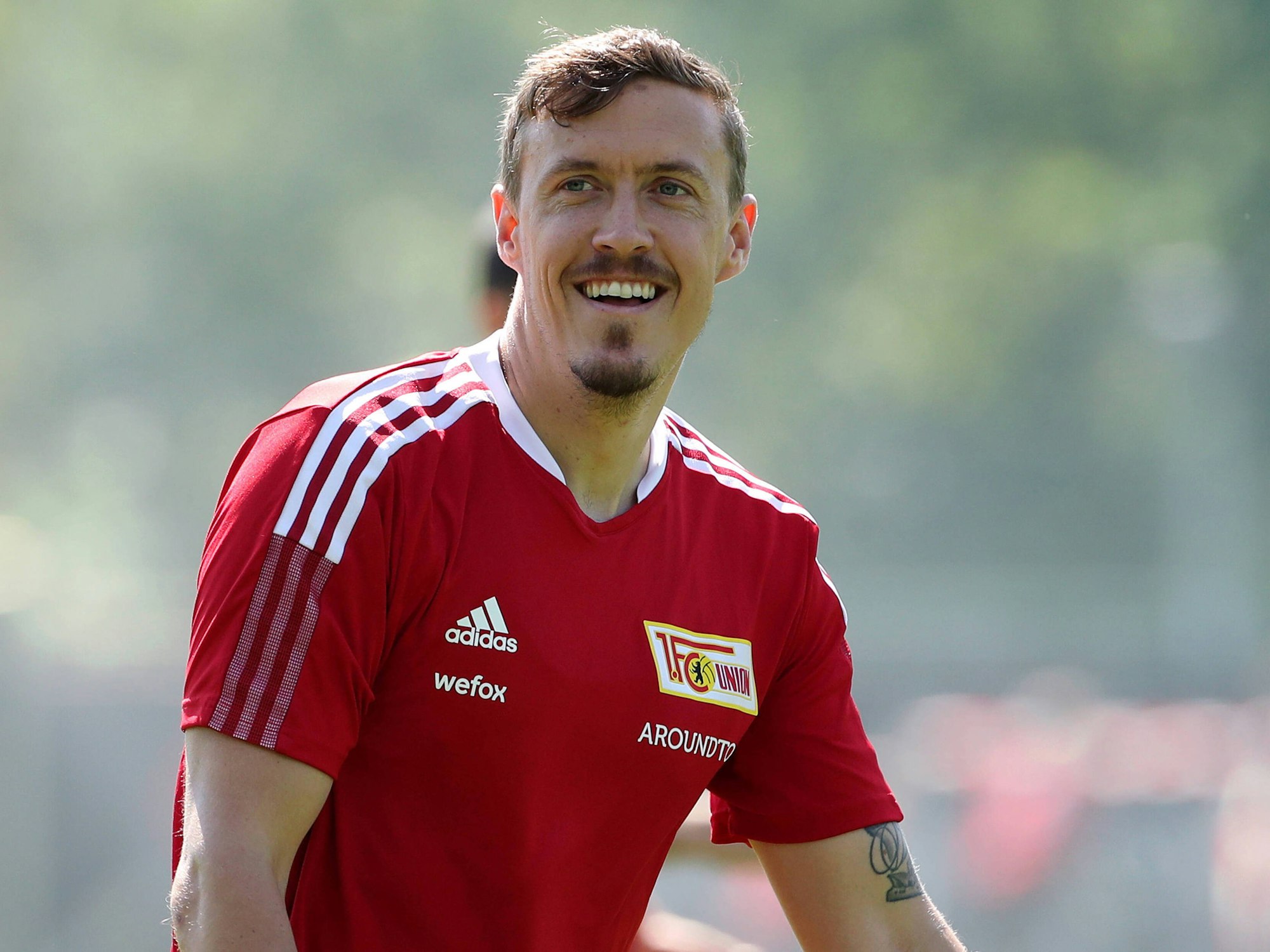 Max Kruse lachend beim Training von Union Berlin.