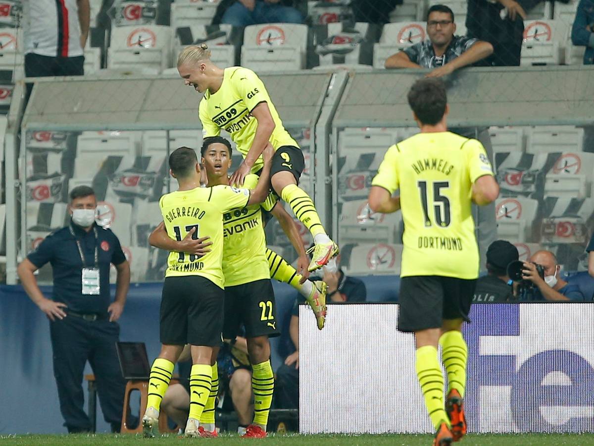 Dortmund players celebrate after Dortmund's Jude Bellingham scored his side's opening goal during the Champions League Group C soccer match between Besiktas and Borussia Dortmund at the Vodafone Park Stadium in Istanbul, Turkey, Wednesday, Sept. 15, 2021. (AP Photo)