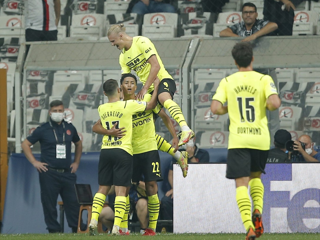 Dortmund players celebrate after Dortmund's Jude Bellingham scored his side's opening goal during the Champions League Group C soccer match between Besiktas and Borussia Dortmund at the Vodafone Park Stadium in Istanbul, Turkey, Wednesday, Sept. 15, 2021. (AP Photo)