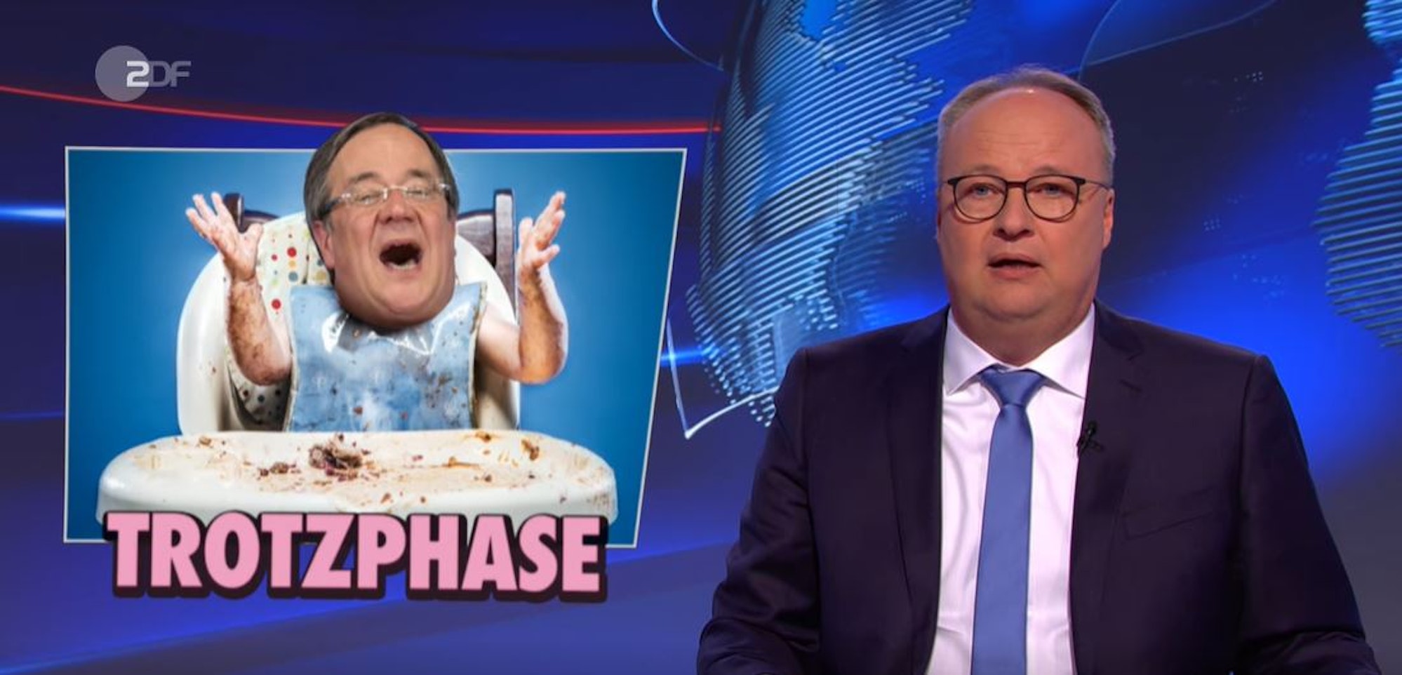 Armin Laschet wird als Kleinkind im Hochstuhl dargestellt mit dem Bildtitel „Trotzphase“.
