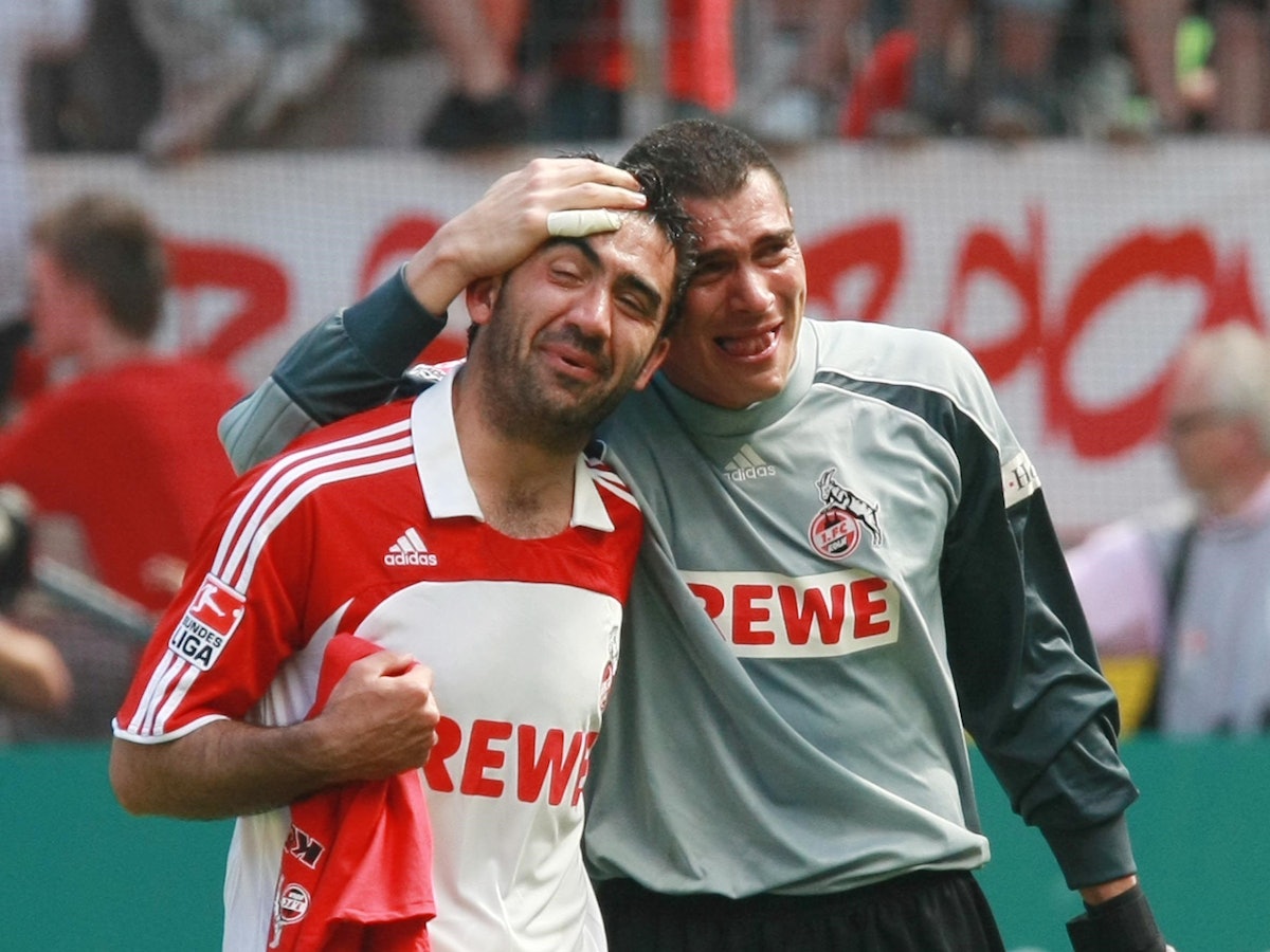 Faryd Mondragon un Ümit Özat feiern Kölns Aufstieg.