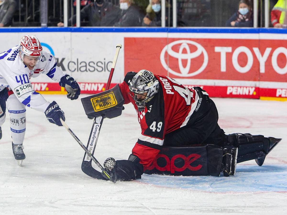 Justin Pogge (Kölner Haie) gegen Ken Andre Olimb (Schwenningen).