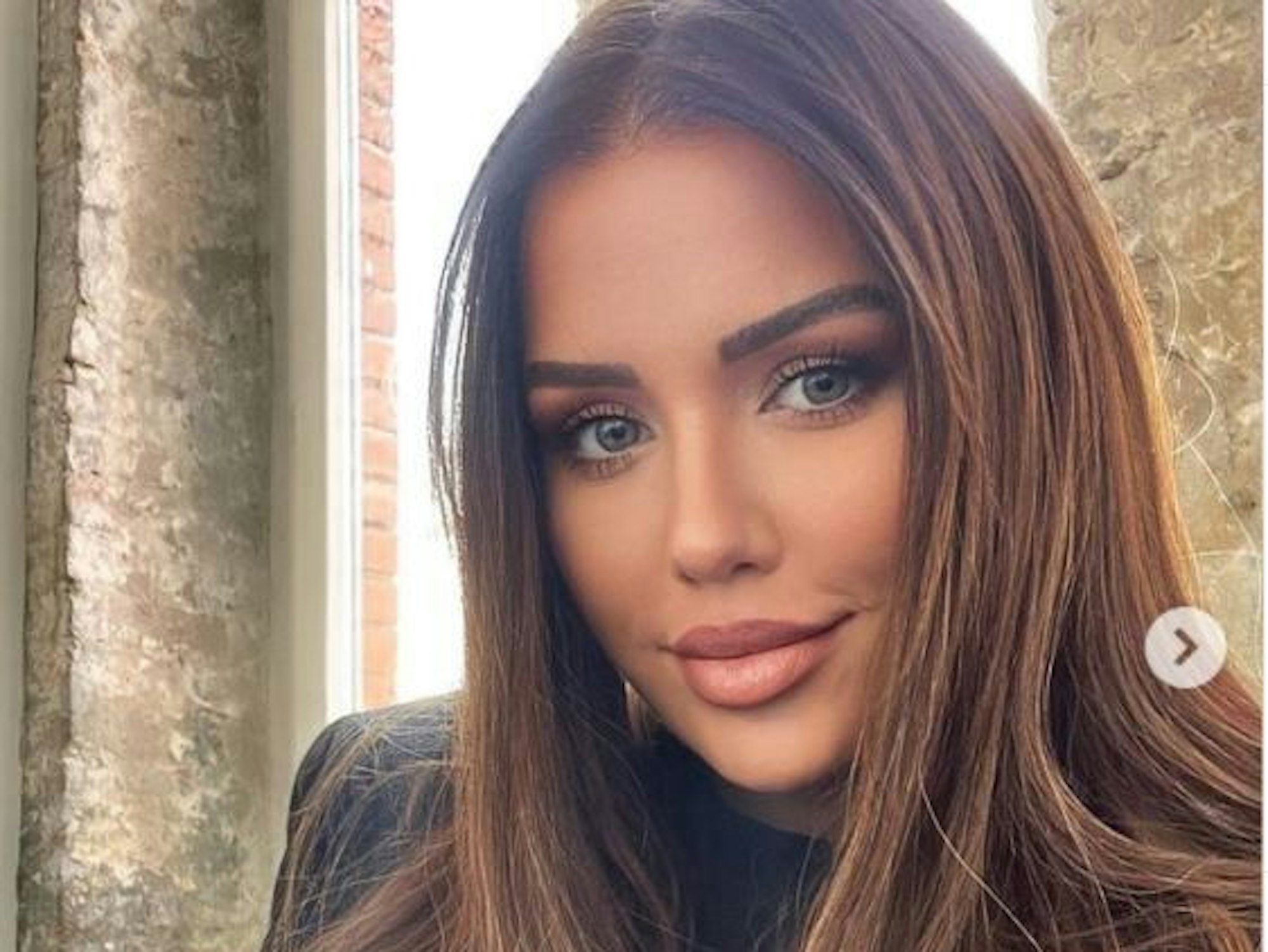 Kim Gloss lächelt in die Kamera.