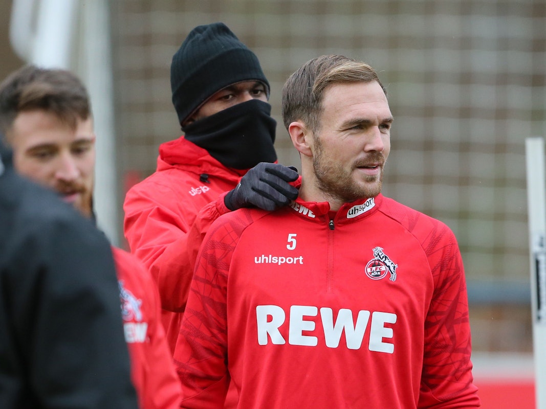 Rafael Czichos scherzt mit Anthony Modeste.