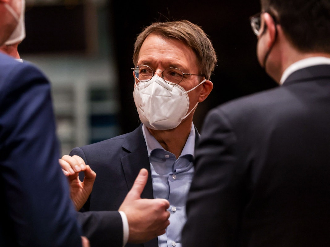 BERLIN, GERMANY - DECEMBER 13: German Health Minister Karl Lauterbach looks on before a government cabinet meeting at the Chancellery on December 13, 2021 in Berlin, Germany. (Photo by Filip Singer - Pool/Getty Images)