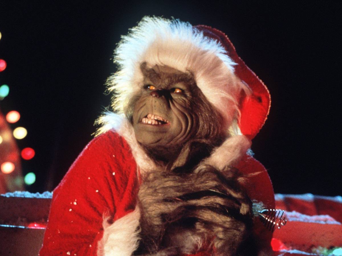 Der hinterlistige „Grinch“ (Jim Carrey) reibt sich in dem US-Film "Der Grinch" (Szenenfoto) verschmitzt seine Pfoten (Archivbild). Rick Baker und Gail Ryan erhielten in der Nacht zum Montag (26.03.2001) in Los Angeles den Oscar für das beste Make-up in dem Film „Der Grinch“.