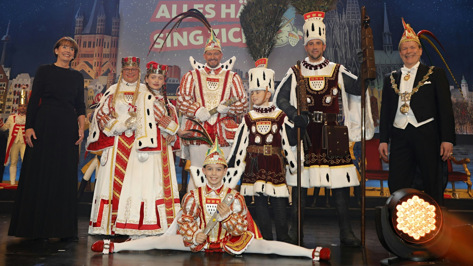 Das große und kleine Kölner Dreigestirn mit Henriette Reker und Christoph Kuckelkorn.
