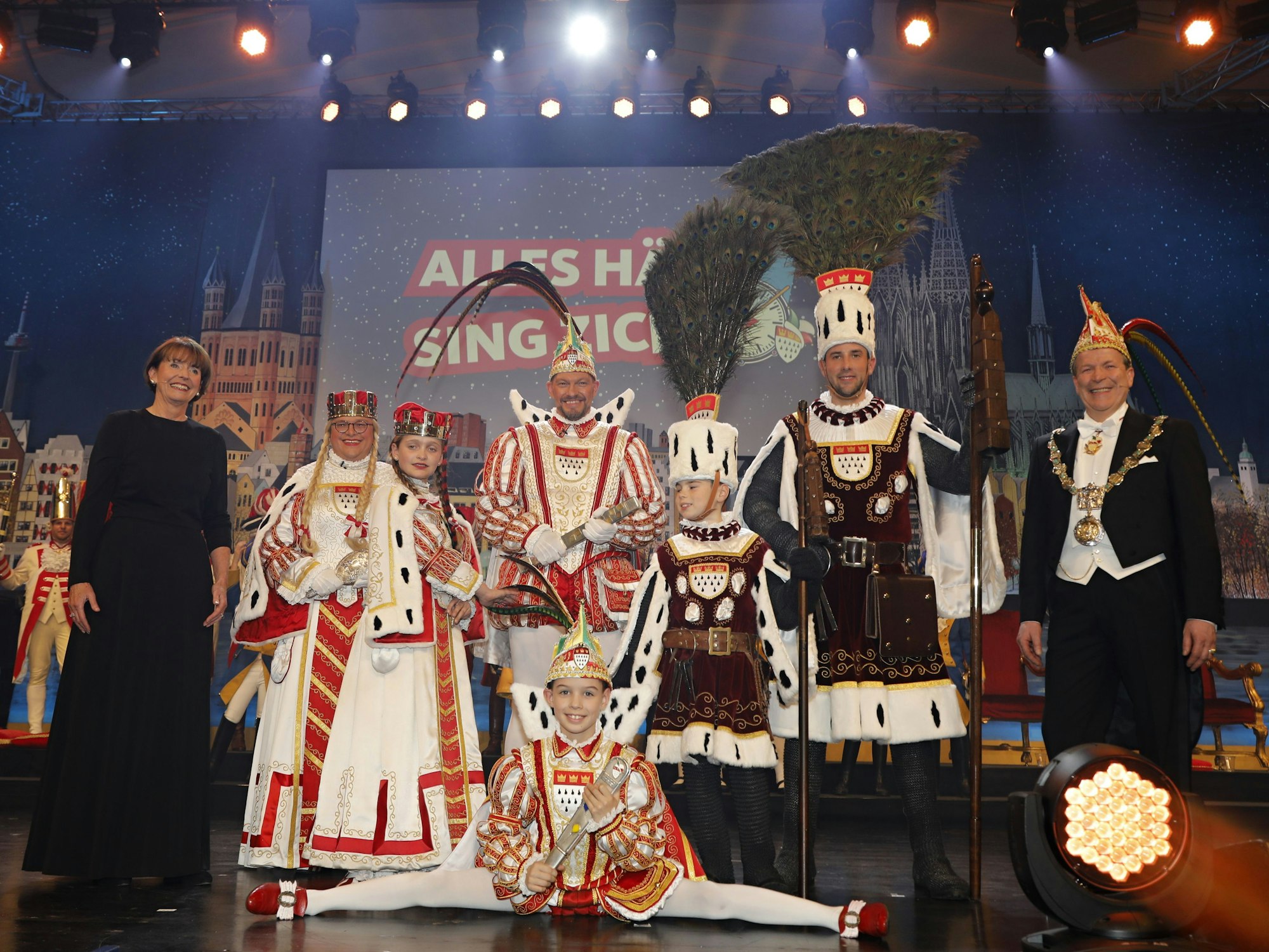 Das große und kleine Kölner Dreigestirn mit Henriette Reker und Christoph Kuckelkorn.