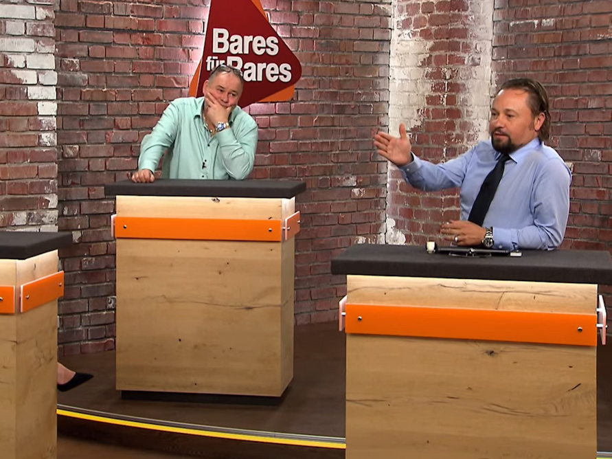 Der Screenshot zeigt die „Bares für Rares“-Händler Wolfgang Pauritsch, Waldi und Susanne Steiger in der Sendung vom 12. Januar 2022.