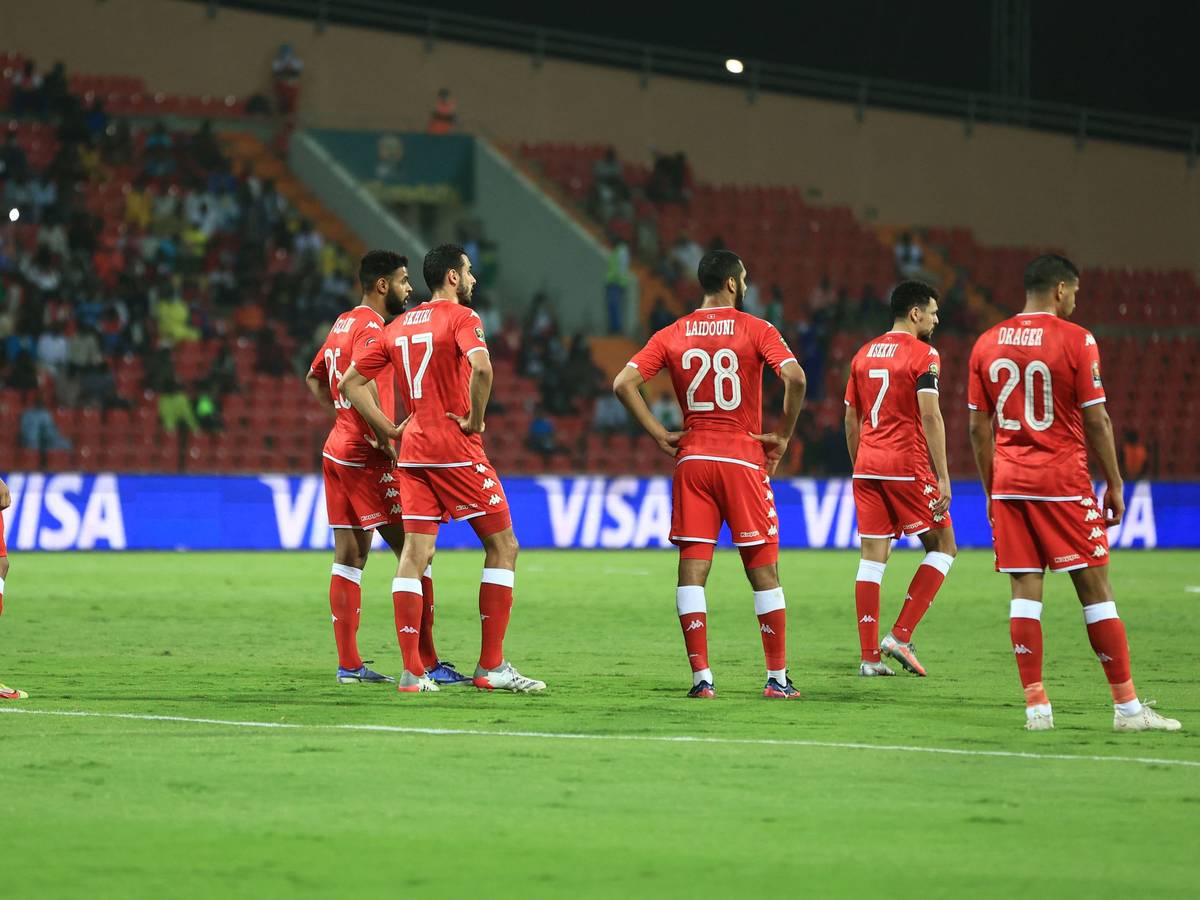 Tunisia's players react after Burkina Faso scored during the Africa Cup of Nations (CAN) 2021 quarter final football match between Burklina Faso and Tunisia at Stade Roumde Adjia in Garoua on January 29, 2022. (Photo by Daniel BELOUMOU OLOMO / AFP)