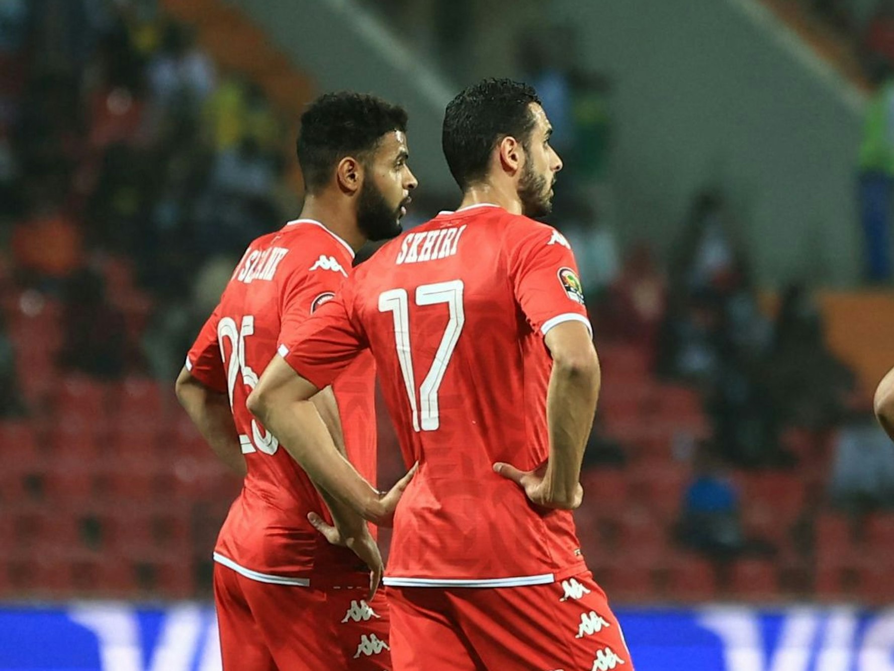 Tunisia's players react after Burkina Faso scored during the Africa Cup of Nations (CAN) 2021 quarter final football match between Burklina Faso and Tunisia at Stade Roumde Adjia in Garoua on January 29, 2022. (Photo by Daniel BELOUMOU OLOMO / AFP)