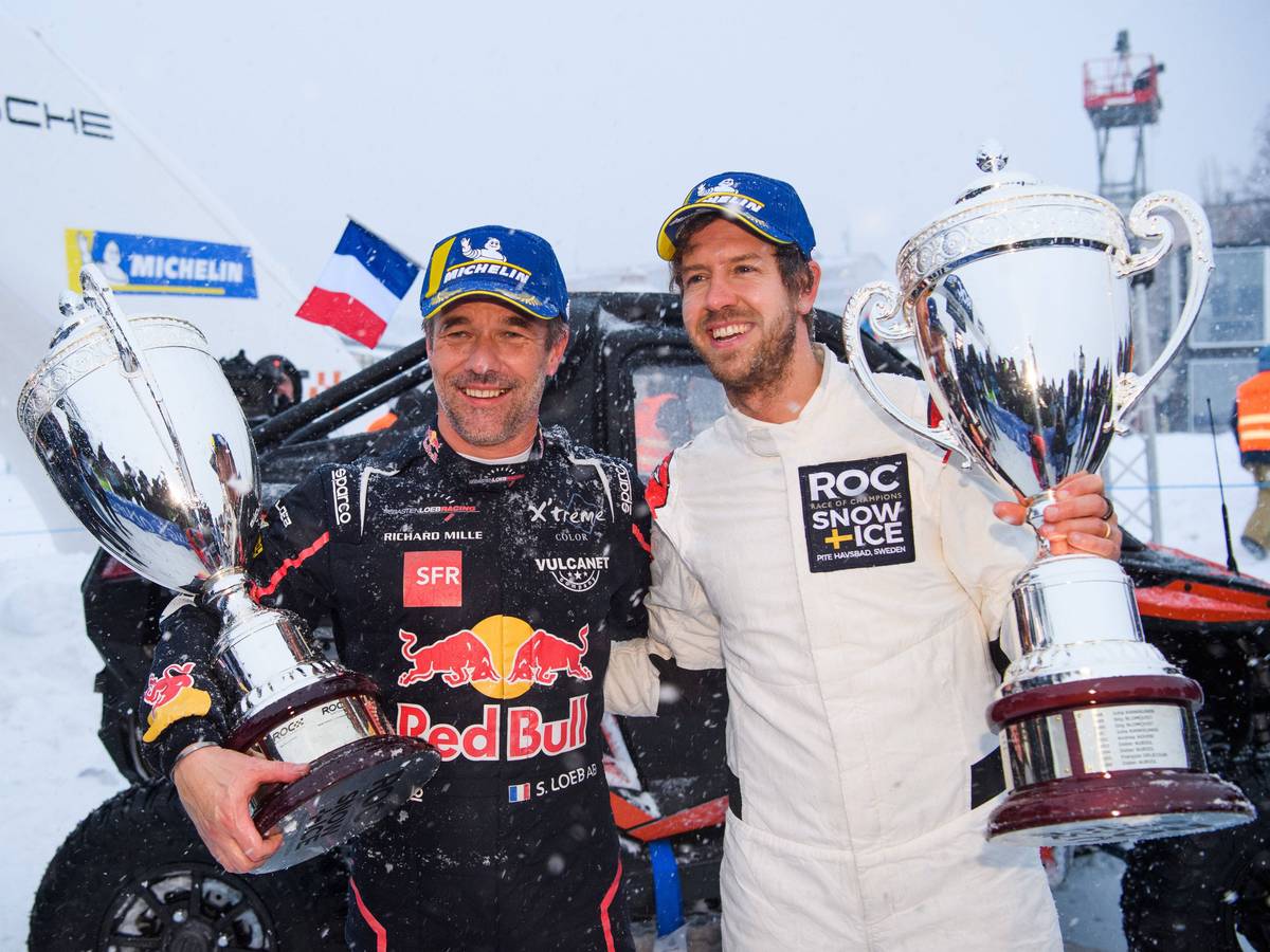 Sebastien Loeb und Sebastian Vettel bei der Siegerehrung.