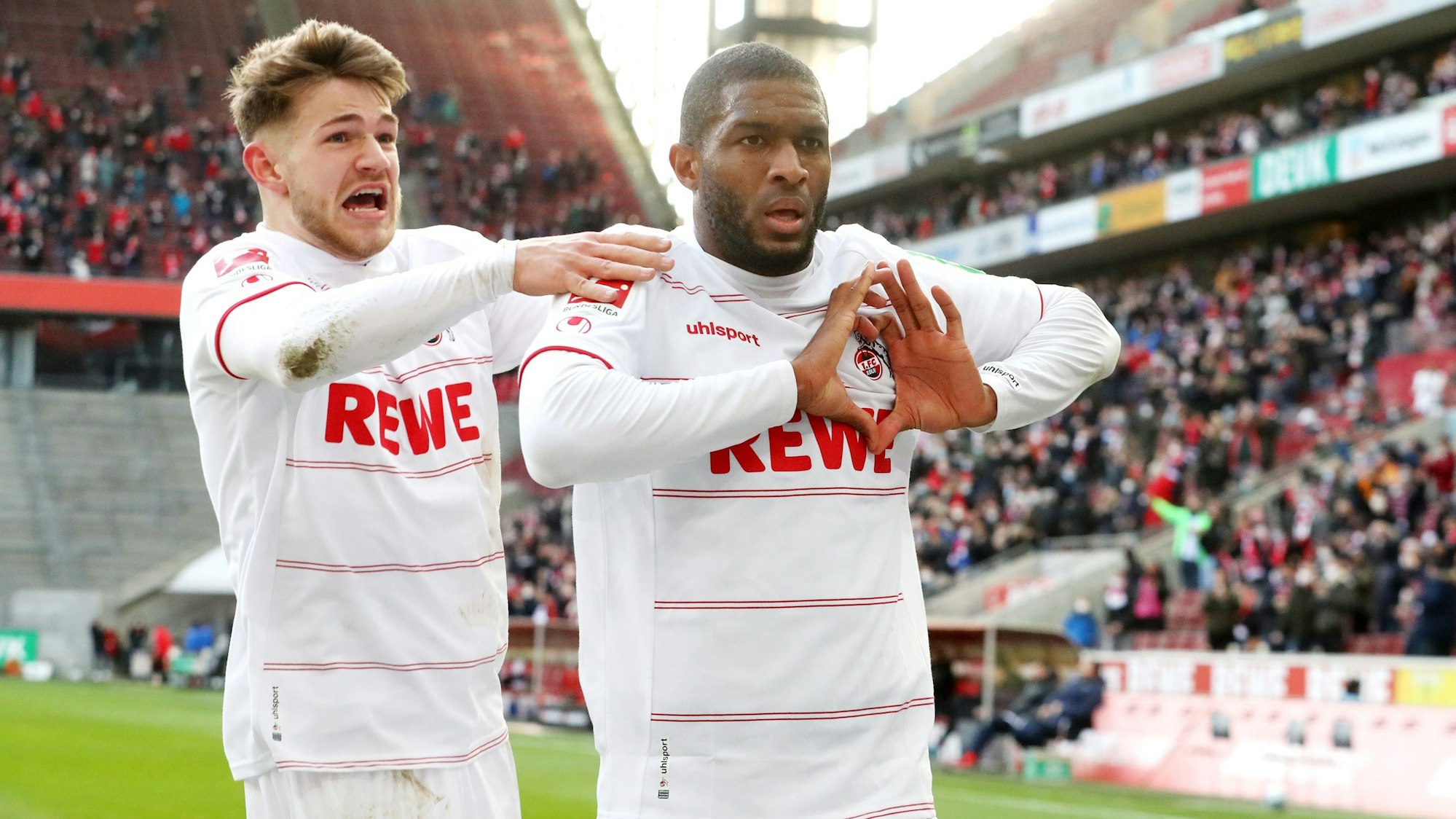 Jan Thielmann und Anthony Modeste jubeln im Rhein-Energie-Stadion.