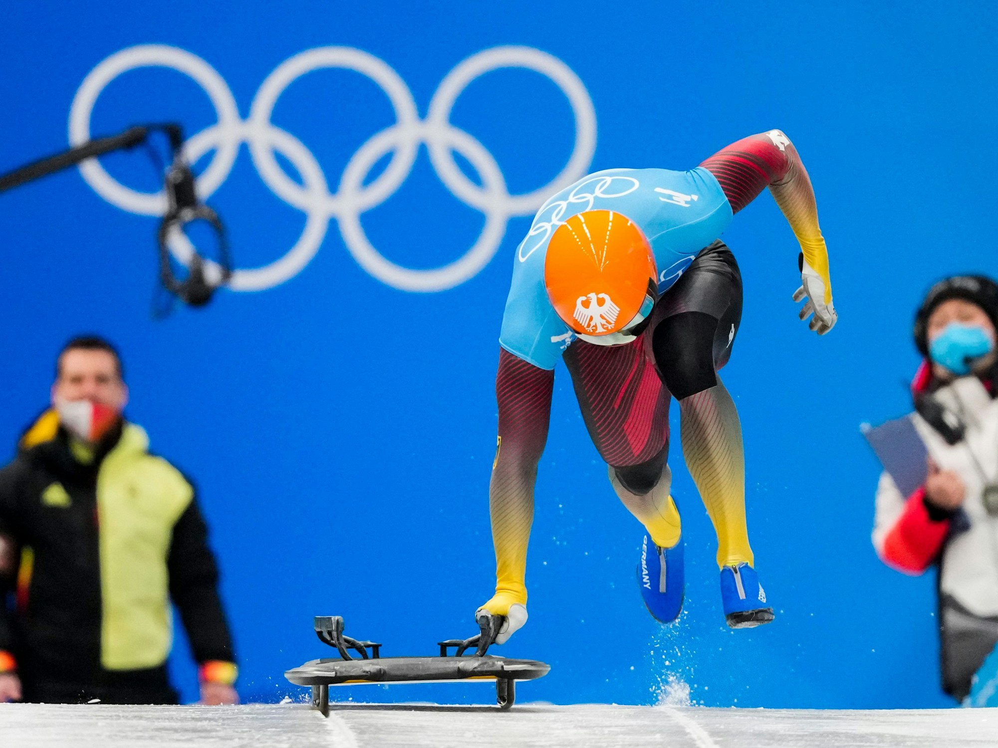 Christopher Grotheer, of Germany, starts the men's skeleton run 3 at the 2022 Winter Olympics, Friday, Feb. 11, 2022, in the Yanqing district of Beijing. (AP Photo/Mark Schiefelbein)
