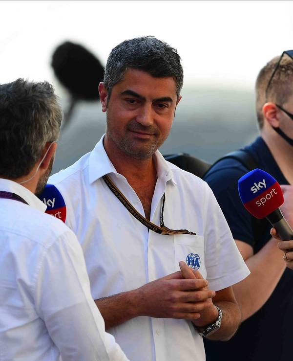 Timo Glock interviewt Michael Masi.