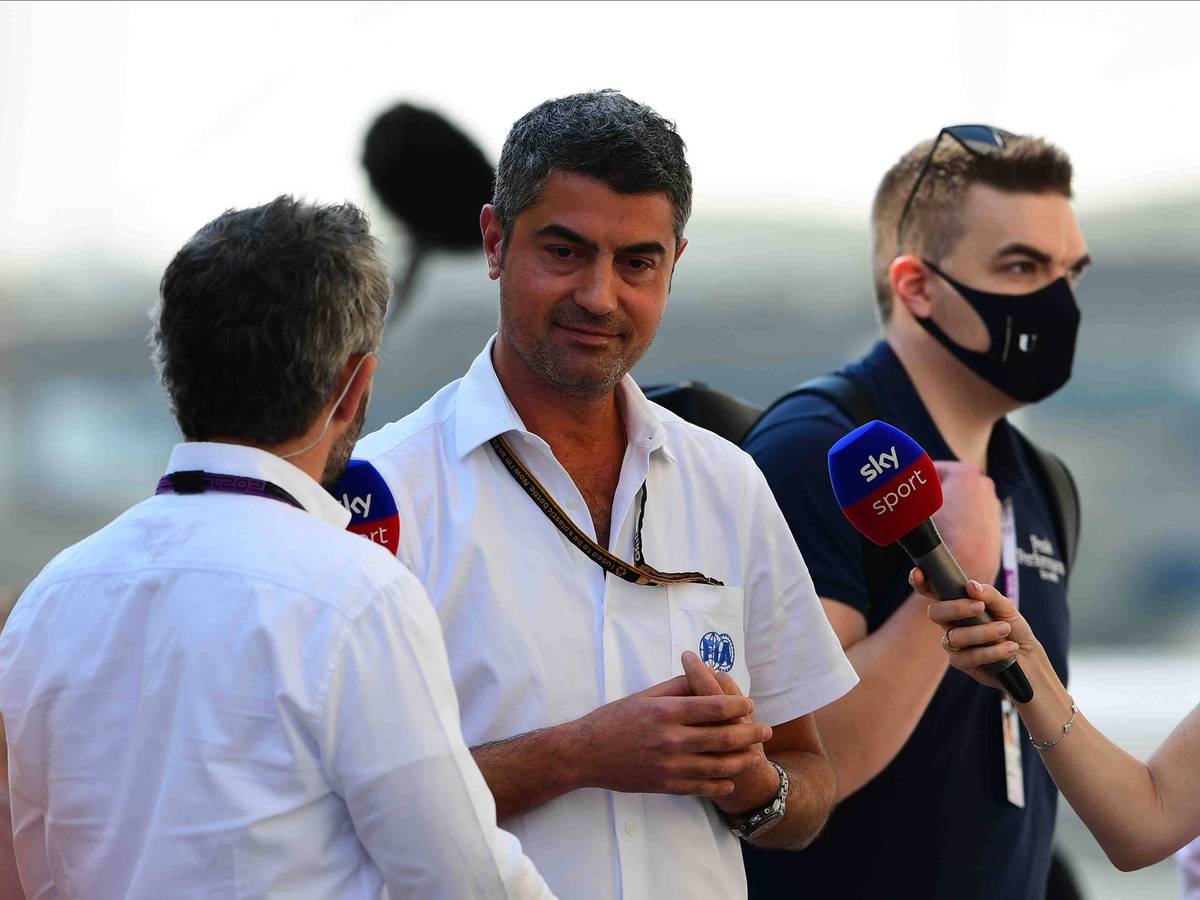 Timo Glock interviewt Michael Masi.