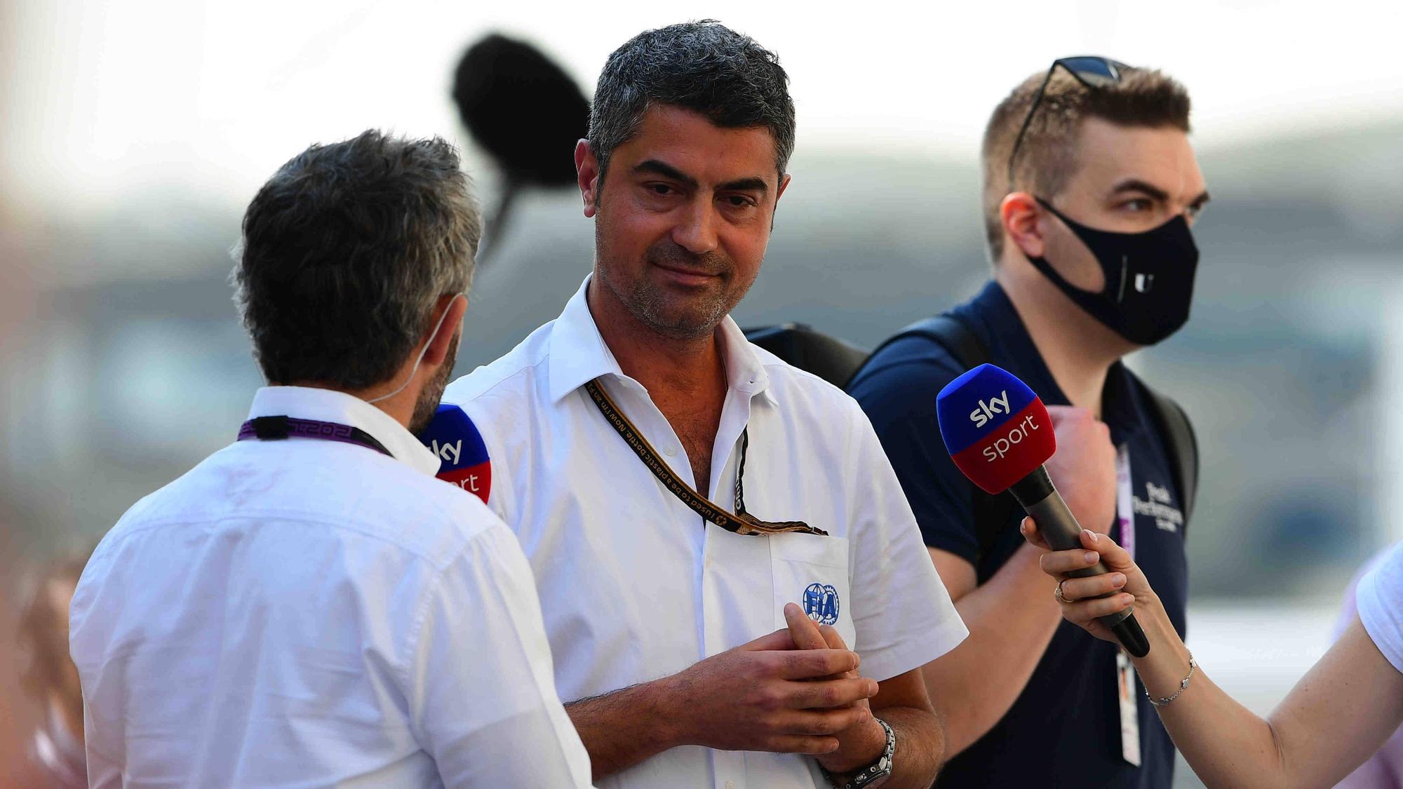Timo Glock interviewt Michael Masi.