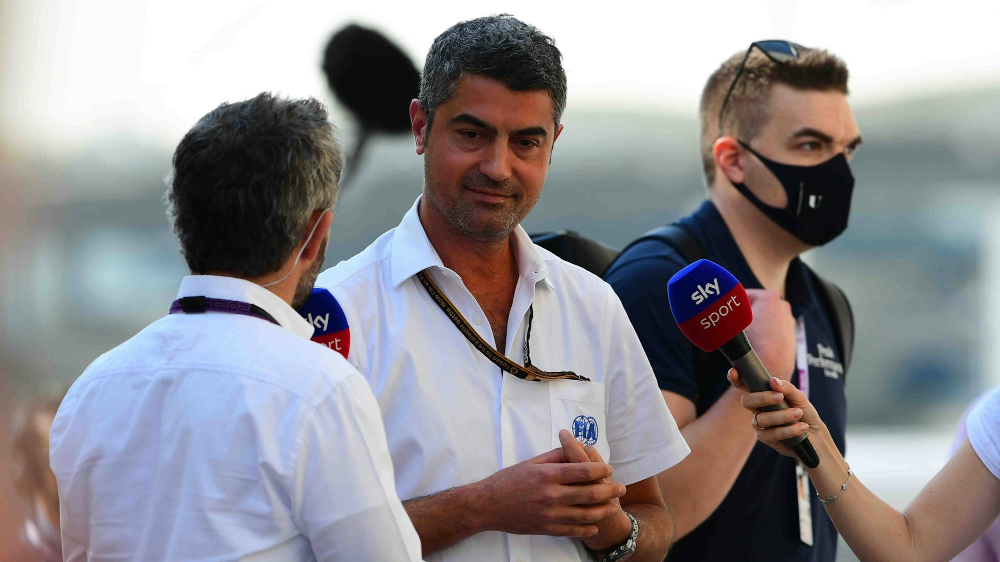 Timo Glock interviewt Michael Masi.
