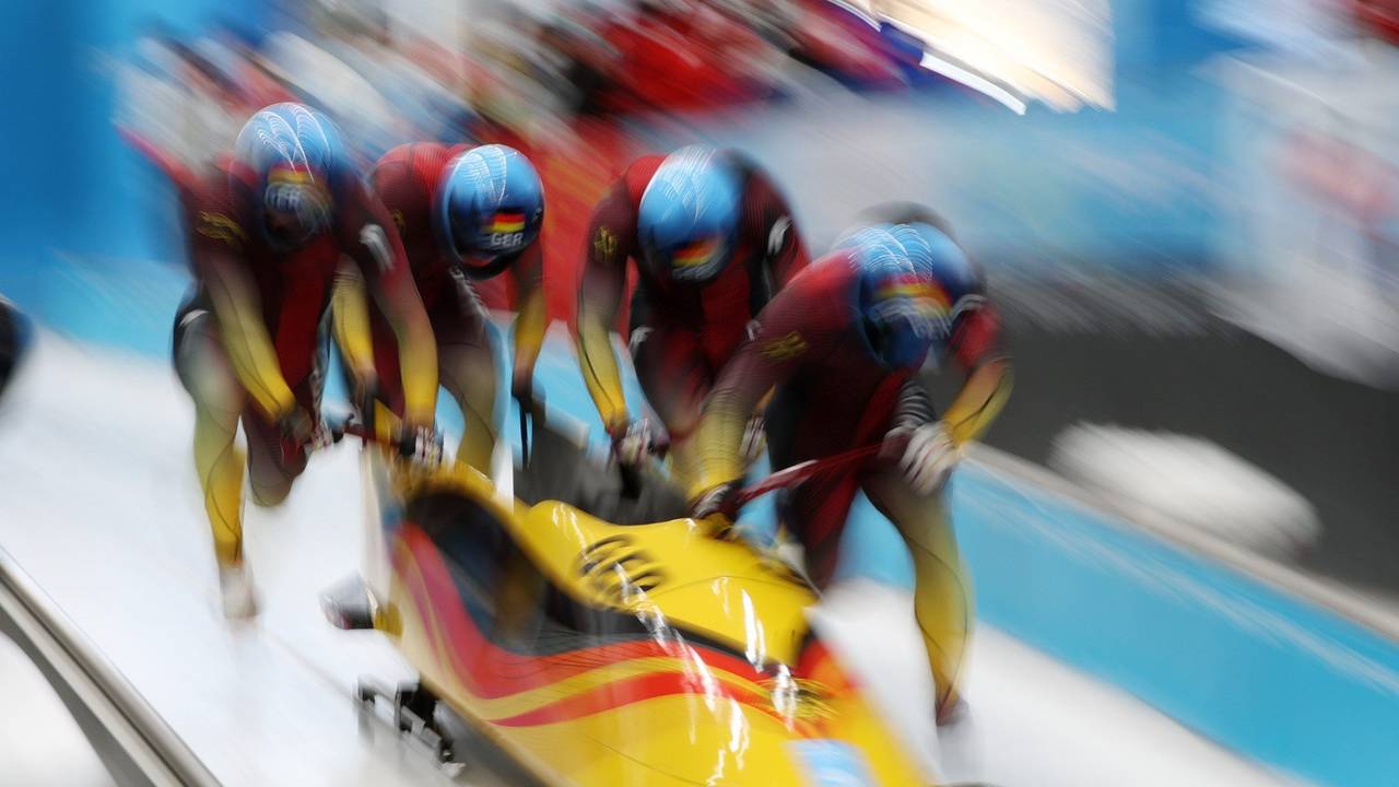 Francesco Friedrich, Thorsten Margis, Candy Bauer and Alexander Schüller bei ihrem Lauf im Vierer-Bob