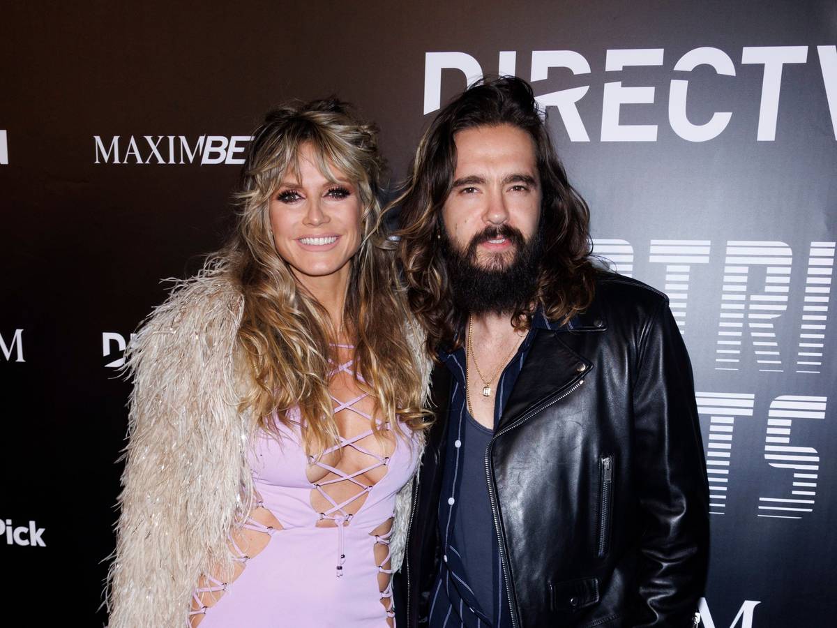 Heidi Klum, left and Tom Kaulitz attend day two of Maxim Big Game Weekend on Saturday, Feb. 12, 2022, at City Market Pavilion in Los Angeles. (Photo by Willy Sanjuan/Invision/AP)