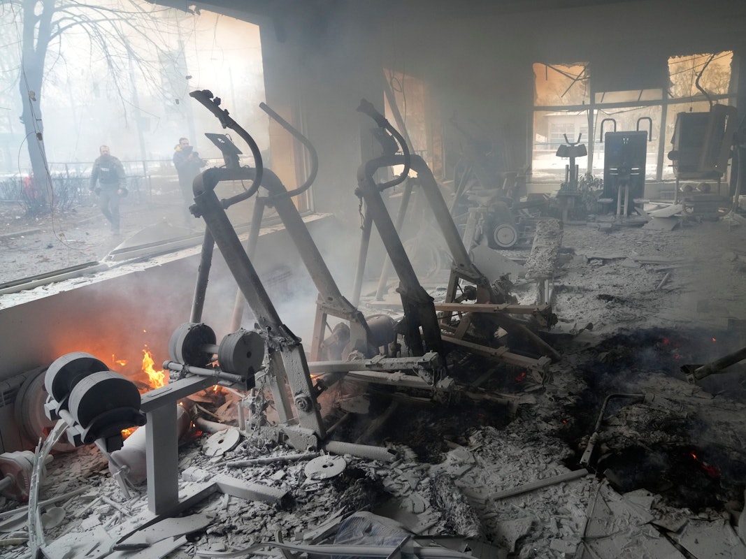 A view of smoke from inside a damaged gym following shelling in Kyiv, Ukraine, Wednesday, March 2, 2022. Russian forces have escalated their attacks on crowded cities in what Ukraine's leader called a blatant campaign of terror. (AP Photo/Efrem Lukatsky)