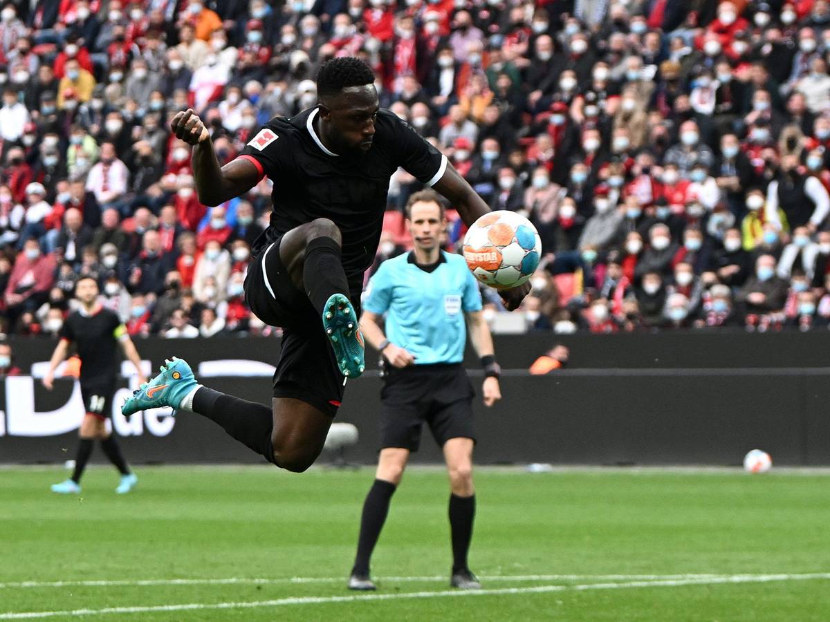LEVERKUSEN, GERMANY - MARCH 13: Kingsley Schindler of FC Koln scores their side's first goal during the Bundesliga match between Bayer 04 Leverkusen and 1. FC Köln at BayArena on March 13, 2022 in Leverkusen, Germany. (Photo by Alexander Scheuber/Getty Images)