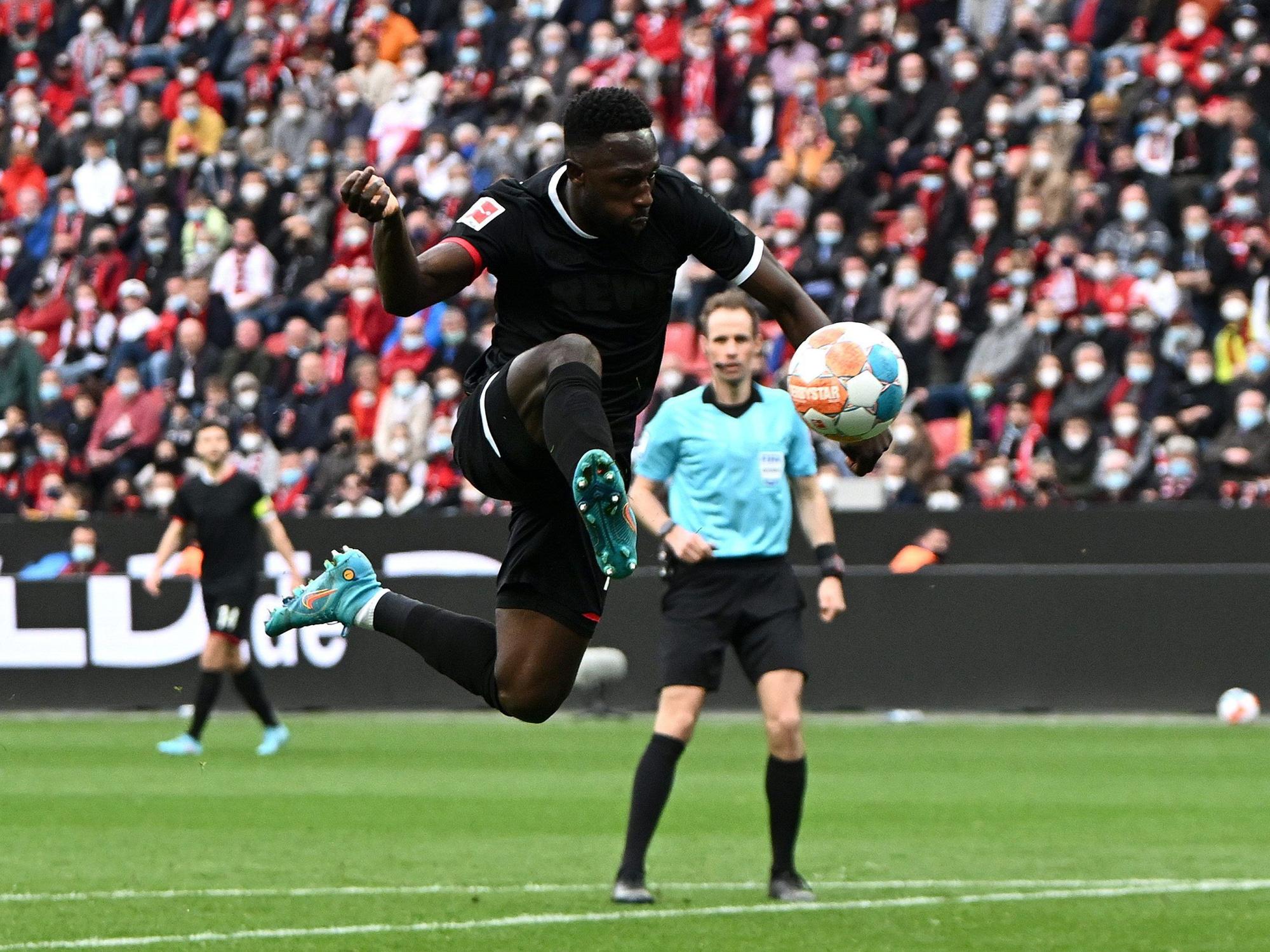 LEVERKUSEN, GERMANY - MARCH 13: Kingsley Schindler of FC Koln scores their side's first goal during the Bundesliga match between Bayer 04 Leverkusen and 1. FC Köln at BayArena on March 13, 2022 in Leverkusen, Germany. (Photo by Alexander Scheuber/Getty Images)