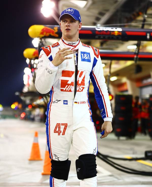 BAHRAIN, BAHRAIN - MARCH 19: Mick Schumacher of Germany and Haas F1 walks in the Pitlane after qualifying in 12th position during qualifying ahead of the F1 Grand Prix of Bahrain at Bahrain International Circuit on March 19, 2022 in Bahrain, Bahrain. (Photo by Mark Thompson/Getty Images)
