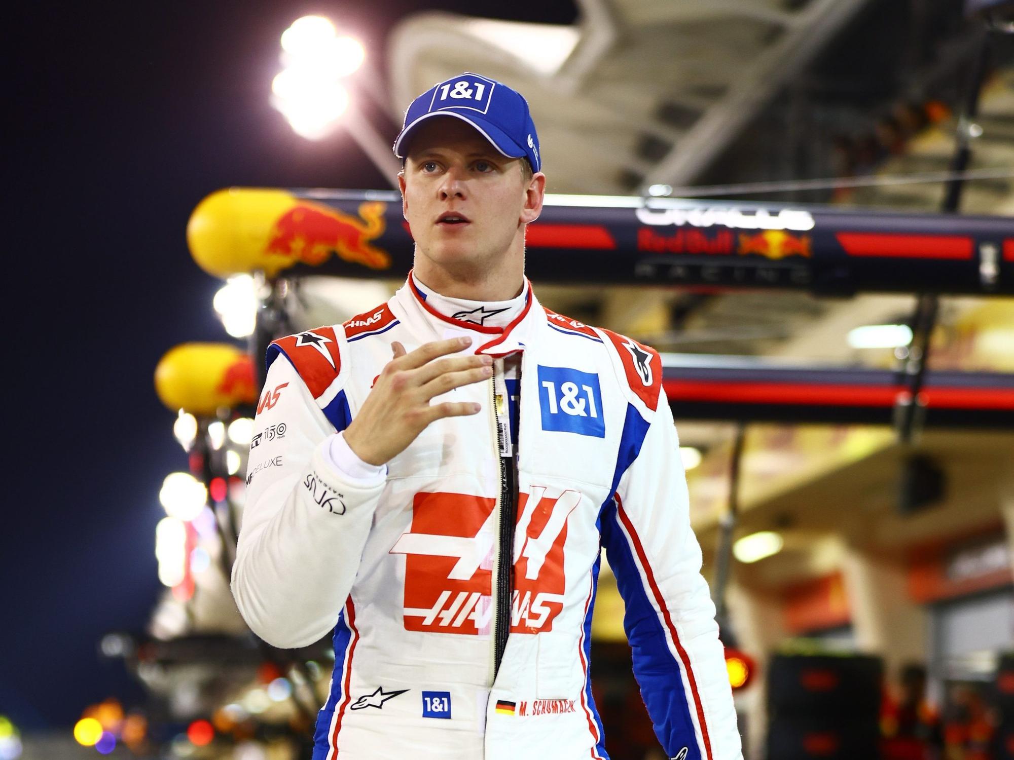 BAHRAIN, BAHRAIN - MARCH 19: Mick Schumacher of Germany and Haas F1 walks in the Pitlane after qualifying in 12th position during qualifying ahead of the F1 Grand Prix of Bahrain at Bahrain International Circuit on March 19, 2022 in Bahrain, Bahrain. (Photo by Mark Thompson/Getty Images)