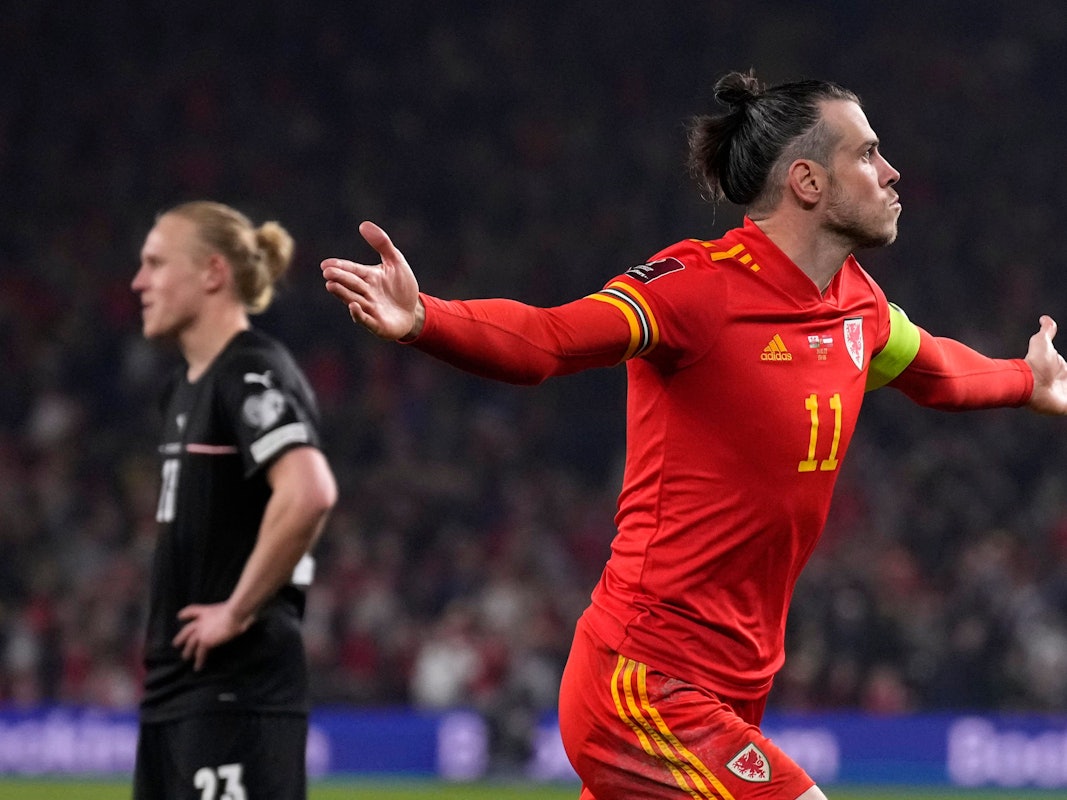 Wales' Gareth Bale celebrates after scoring his side's second goal during the World Cup 2022 playoff soccer match between Wales and Austria at Cardiff City stadium, in Cardiff, Britain, Thursday, March 24, 2022. (AP Photo/Matt Dunham)