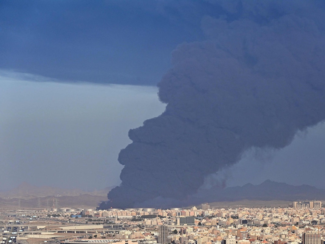 Smoke billows from an oil storage facility in Saudi Arabia's Red Sea coastal city of Jeddah on March 25, 2022. (Photo by ANDREJ ISAKOVIC / AFP)