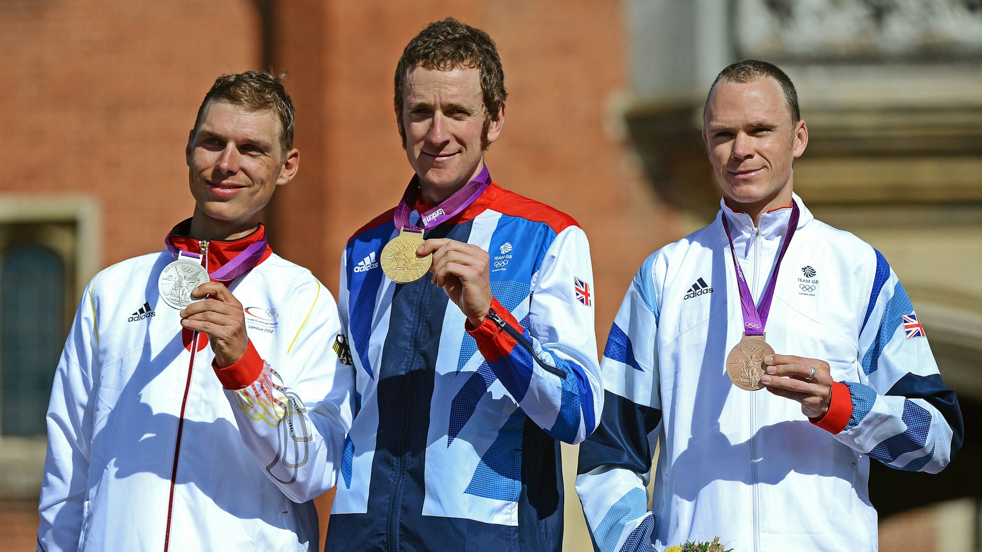 Tony Martin 2012 bei der Olympia-Siegerehrung neben Bradley Wiggins (M.) und Chris Froome (r.).