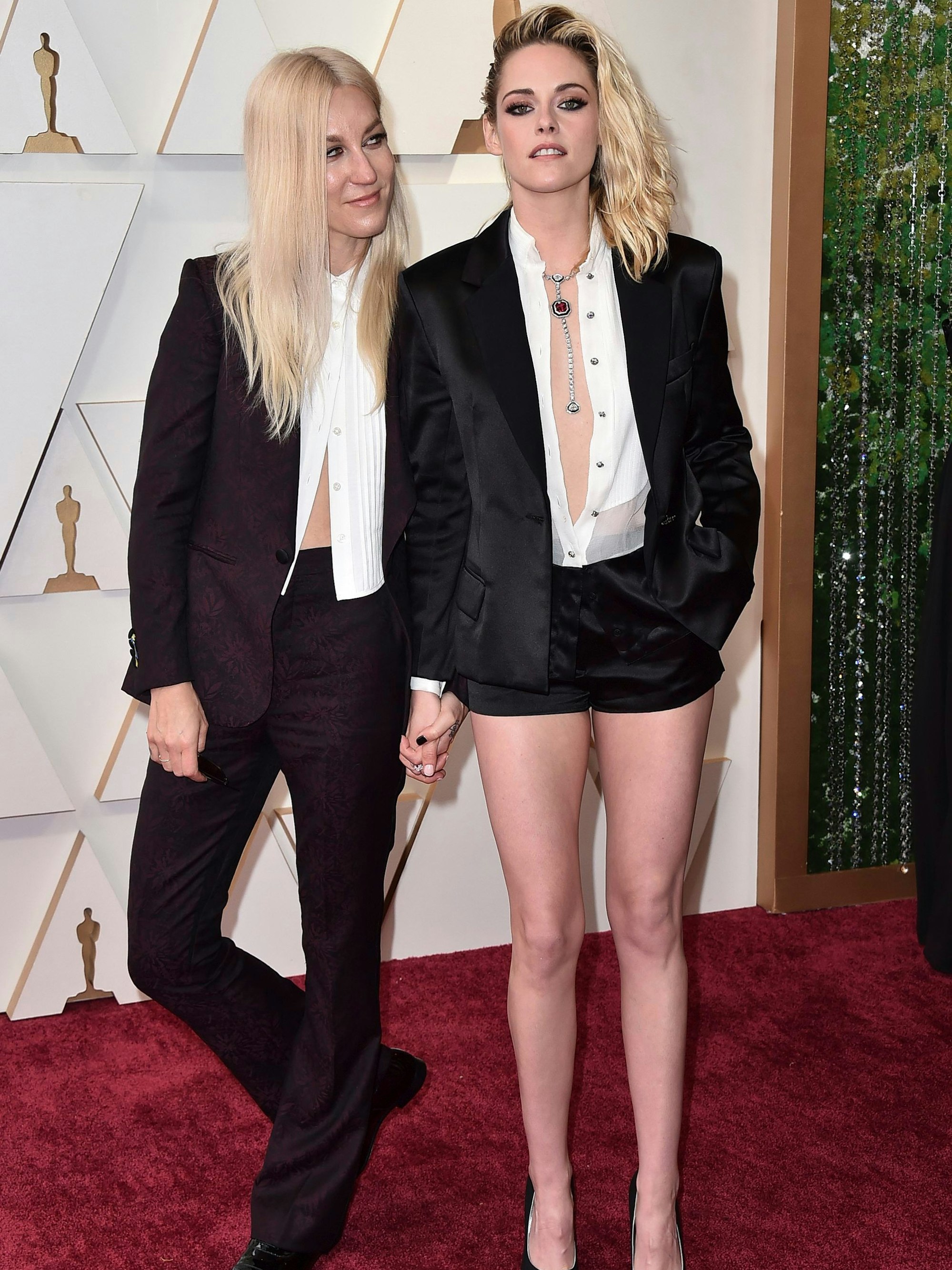 Dylan Meyer, left, and Kristen Stewart arrive at the Oscars on Sunday, March 27, 2022, at the Dolby Theatre in Los Angeles. (Photo by Jordan Strauss/Invision/AP)
