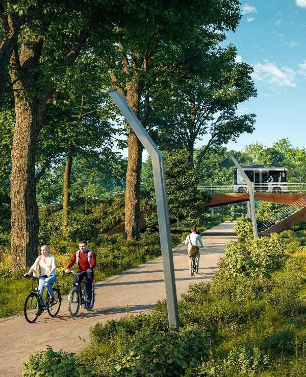 Menschen befinden sich an einem Kanal mit viel Grün.