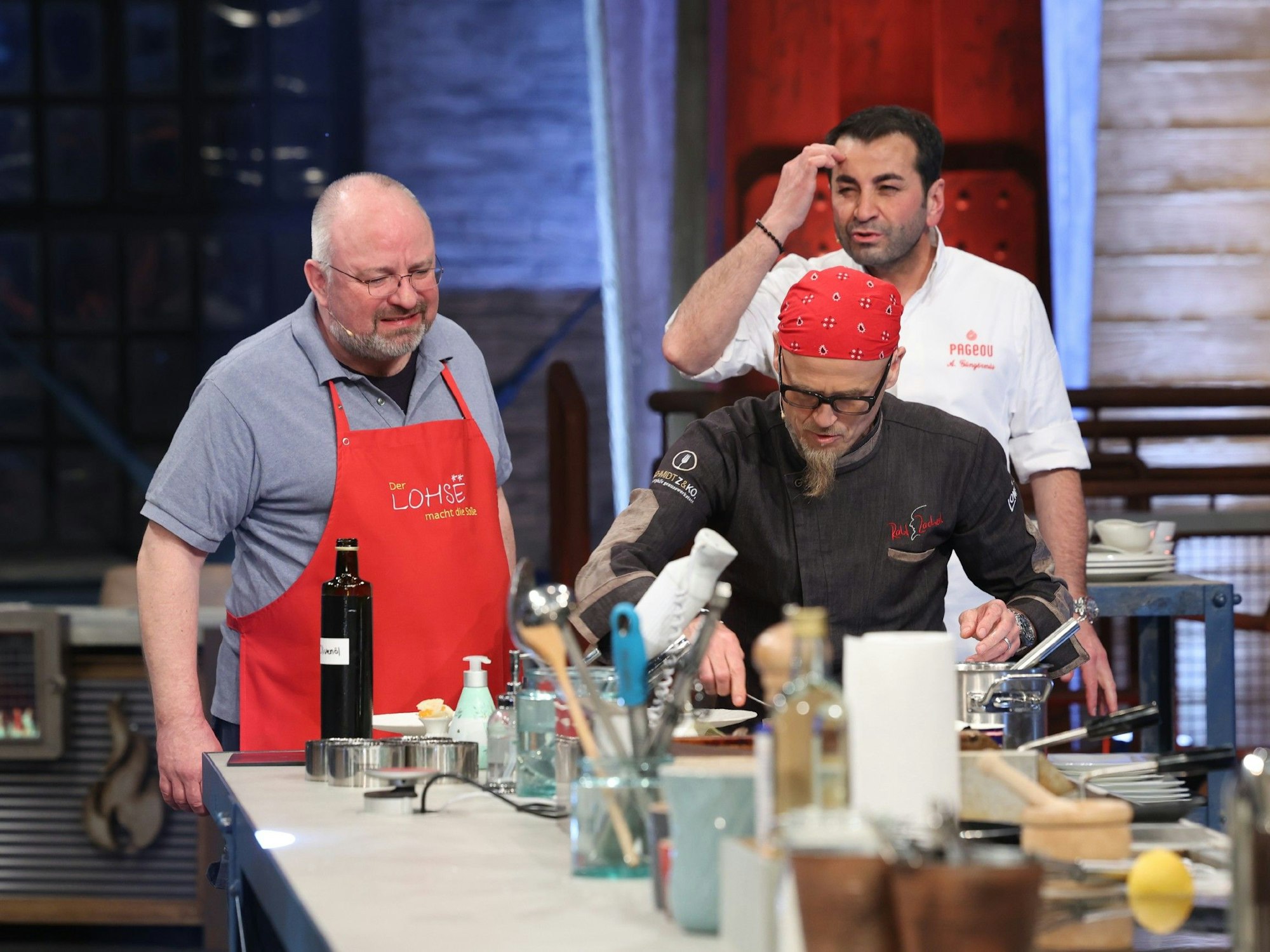 Christian Lohse, Ralf Zacherl und Ali Güngörmüs (v.l.n.r.) bei „Grill den Henssler“.