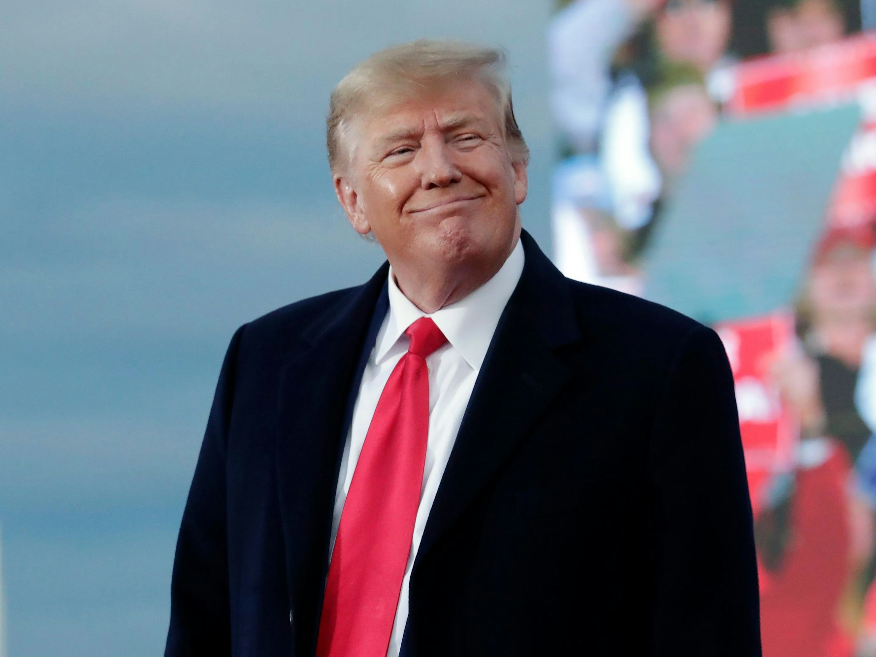 Donald Trump, ehemaliger US-Präsident, lächelt während einer Kundgebung in North Carolina.