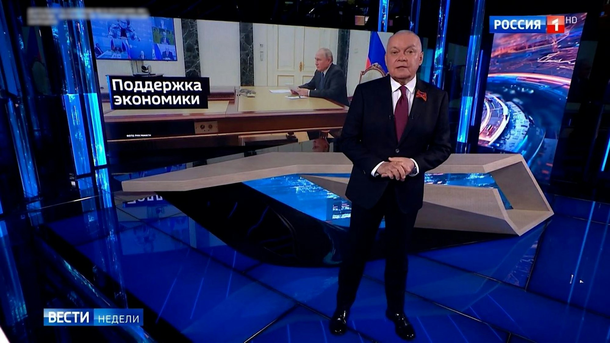 Dmitri Kisseljow, Chef-Propagandist und TV-Moderator bei „Rossija 1“, bei einer Sendung am 1. Mai:Das Vokabular des Kremls hat sich seit Kriegsbeginn verändert.