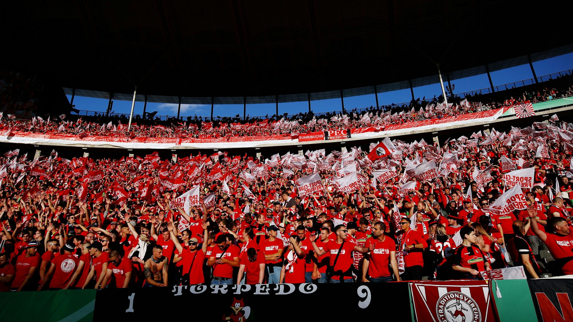 BERLIN, GERMANY - MAY 21: SC Freiburg fans show their support prior to the final match of the DFB Cup 2022 between SC Freiburg and RB Leipzig at Olympiastadion on May 21, 2022 in Berlin, Germany. (Photo by Dean Mouhtaropoulos/Getty Images)