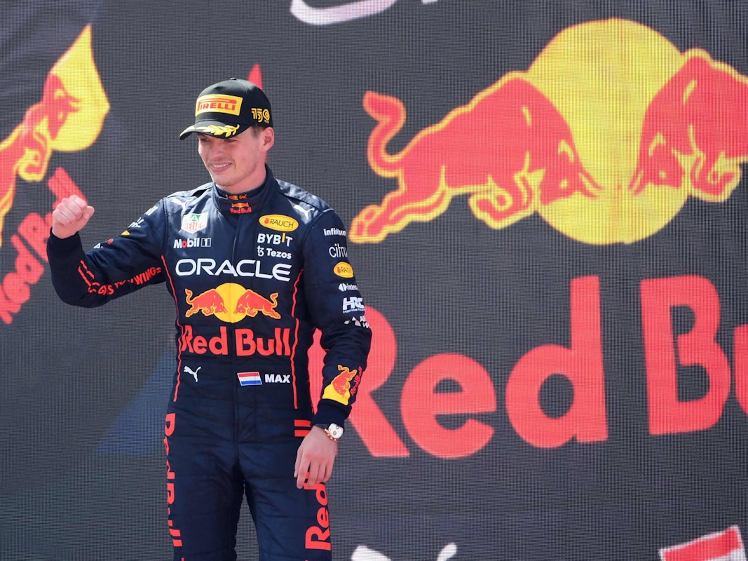 Red Bull's Dutch driver Max Verstappen celebrates on the podium after winning the Spanish Formula One Grand Prix at the Circuit de Catalunya on May 21, 2022 in Montmelo, on the outskirts of Barcelona. (Photo by LLUIS GENE / AFP)