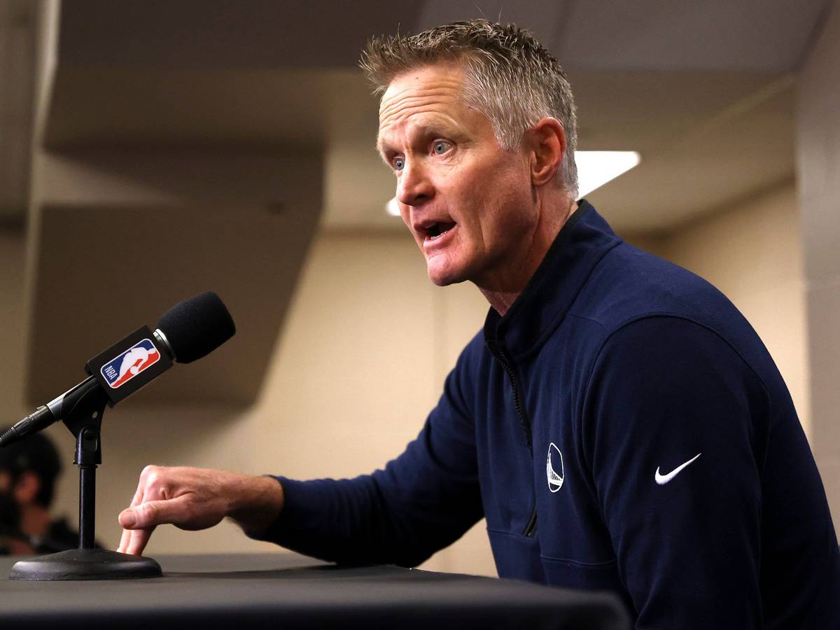 Reacting to the Uvalde, Texas, school shooting earlier in the day, Golden State Warriors coach Steve Kerr makes a statement before Warriors played the Dallas Mavericks in Game 4 of the NBA basketball playoffs Western Conference finals Tuesday, May 24, 2022, in Dallas. (Scott Strazzante/San Francisco Chronicle via AP)